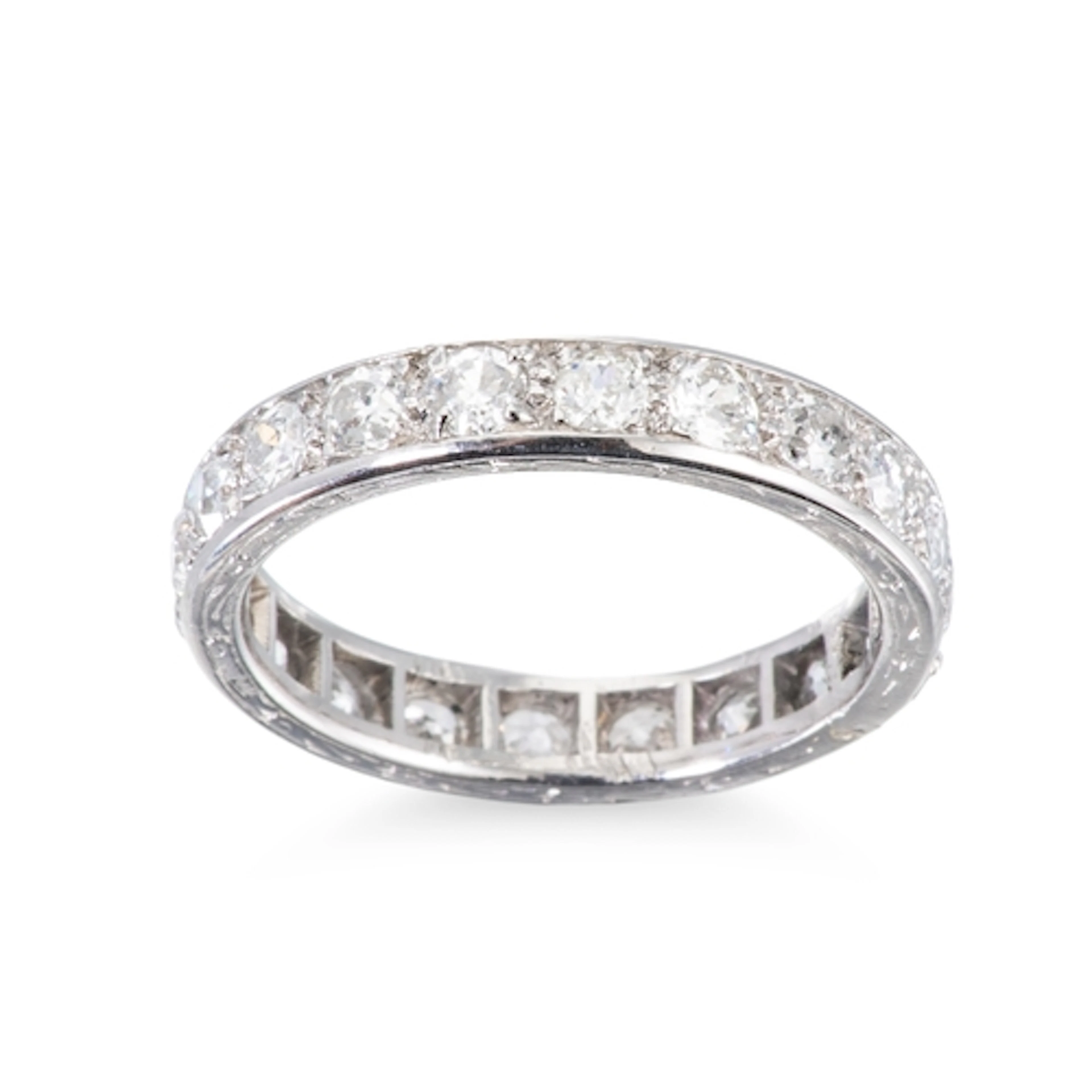 AN EARLY 20TH CENTURY FULL BANDED DIAMOND ETERNITY RING, set...