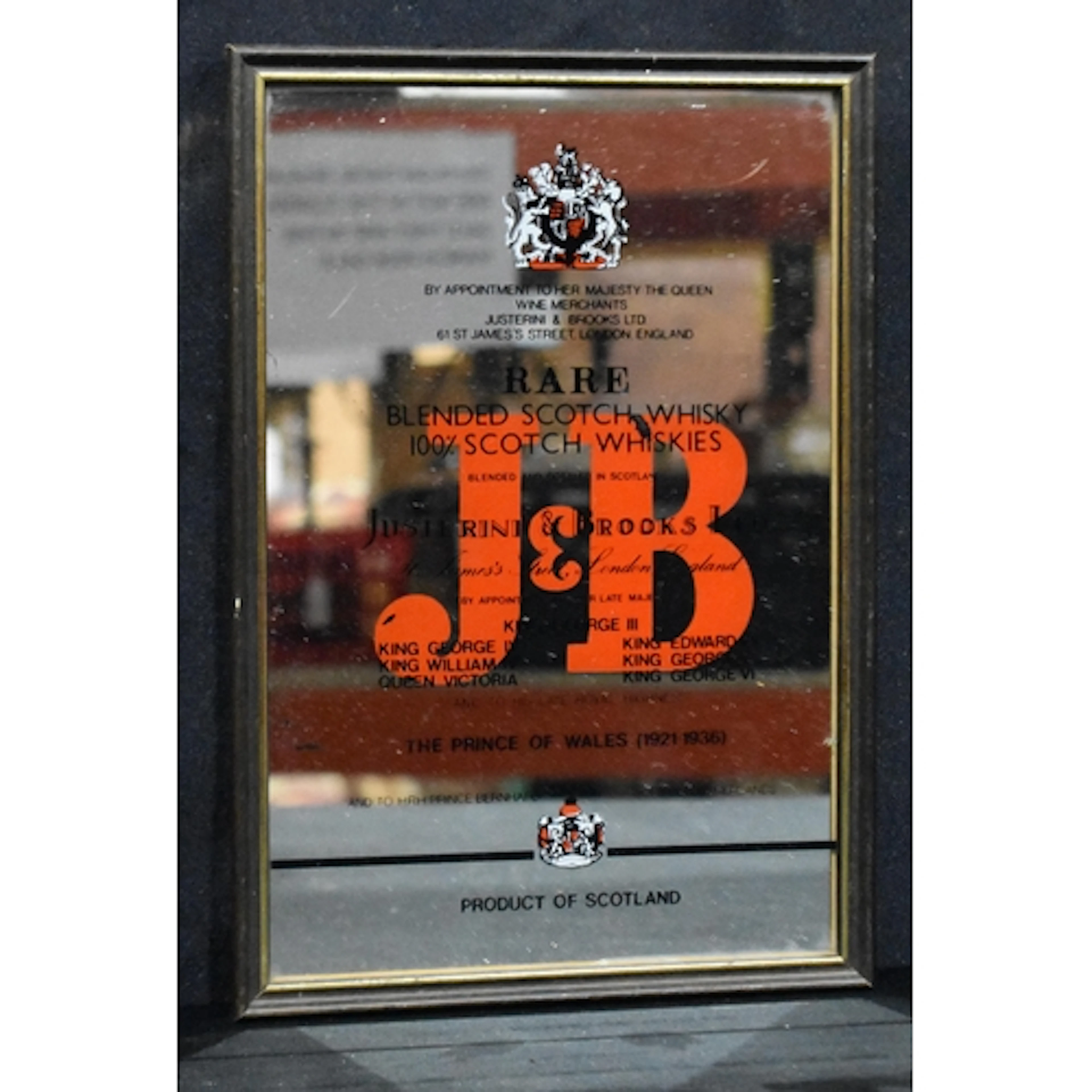 A vintage Justerini & Brookes Ltd Scotch whisky mirror 32 x ...