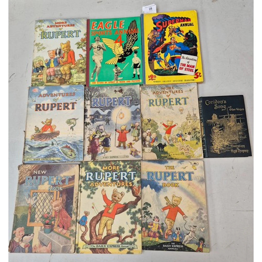 A collection of annuals comprising Superman 1952, Rupert ann...