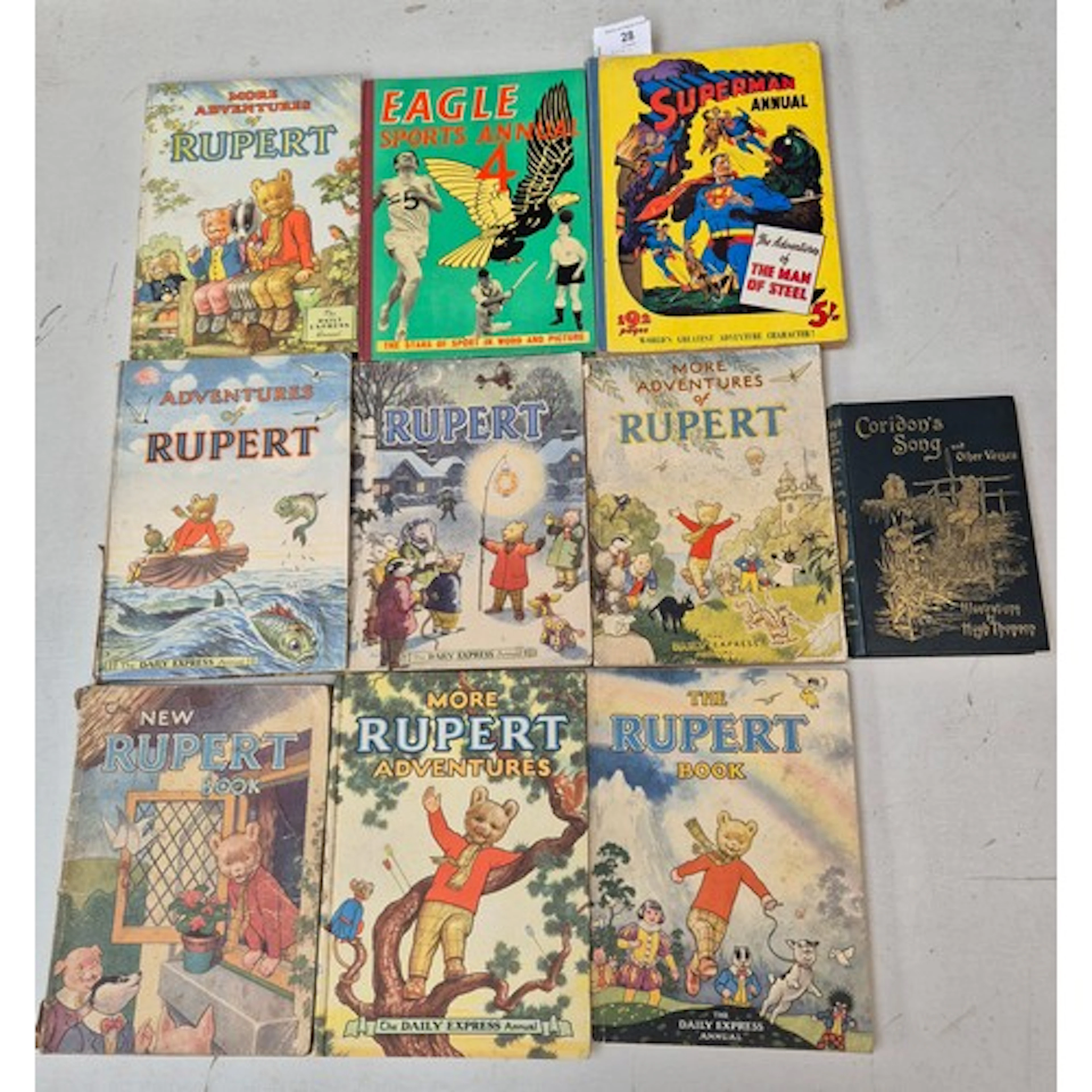 A collection of annuals comprising Superman 1952, Rupert ann...