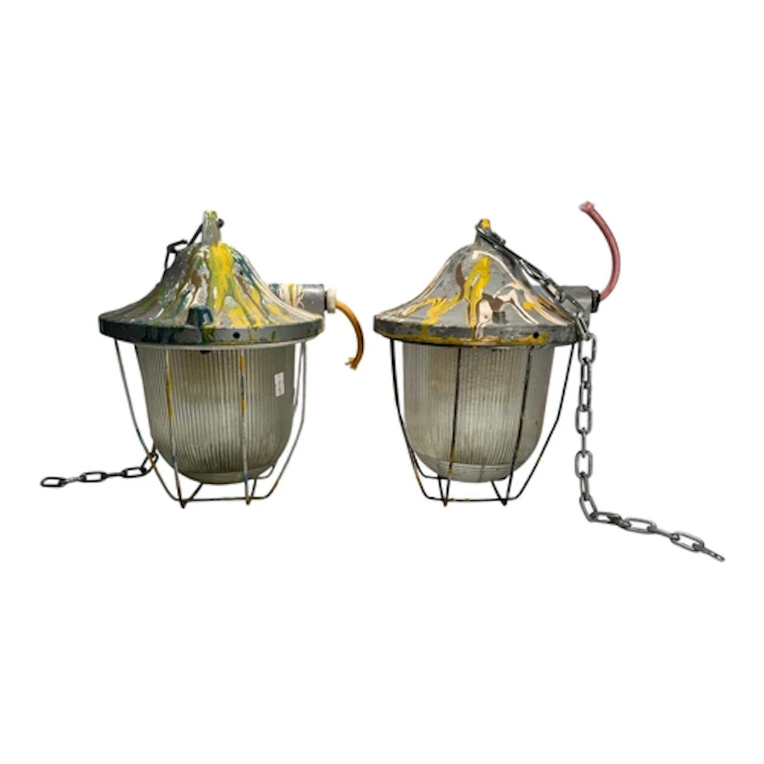A pair of vintage mid 20th century industrial wire cage pend...