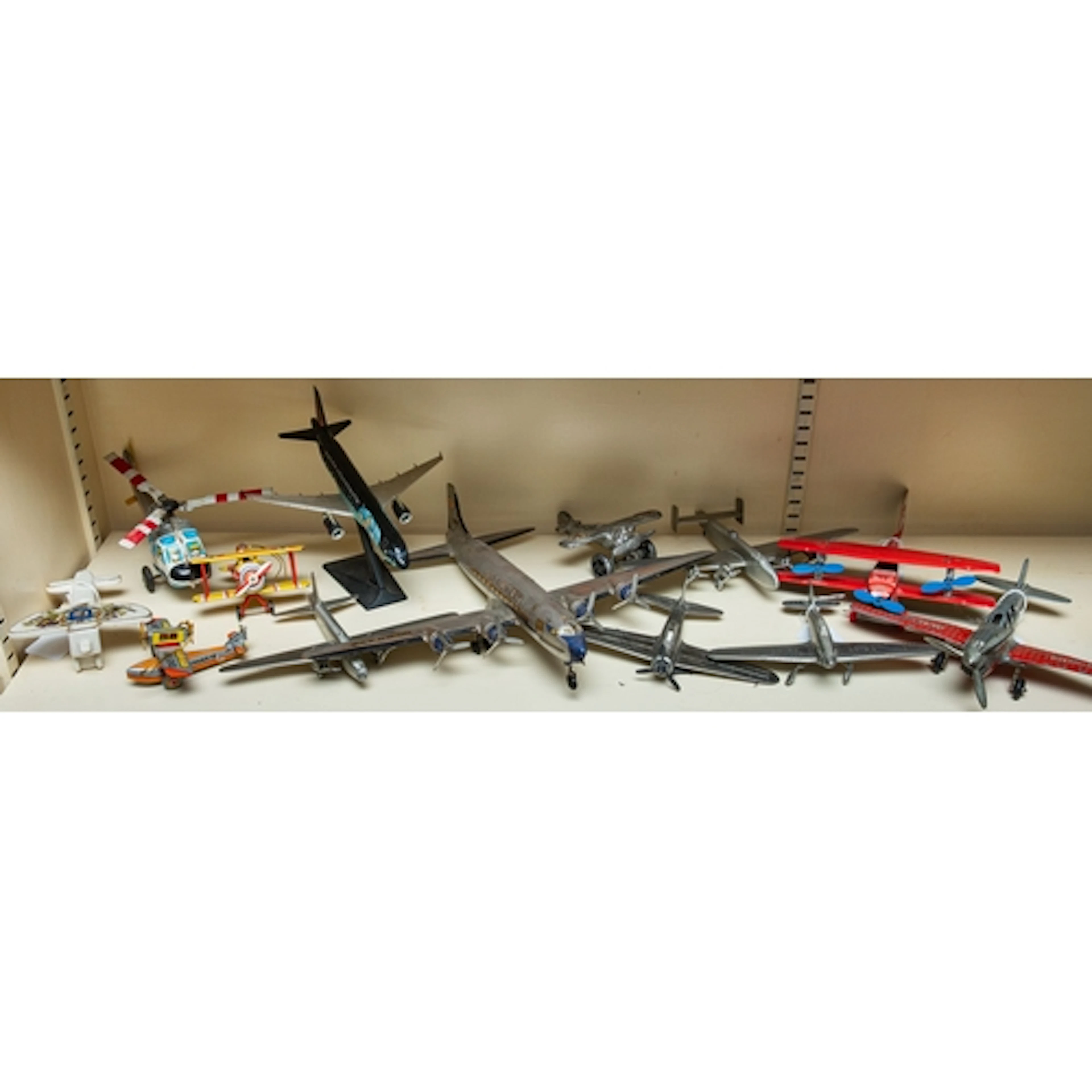 A collection of various toy and model aeroplanes, including ...