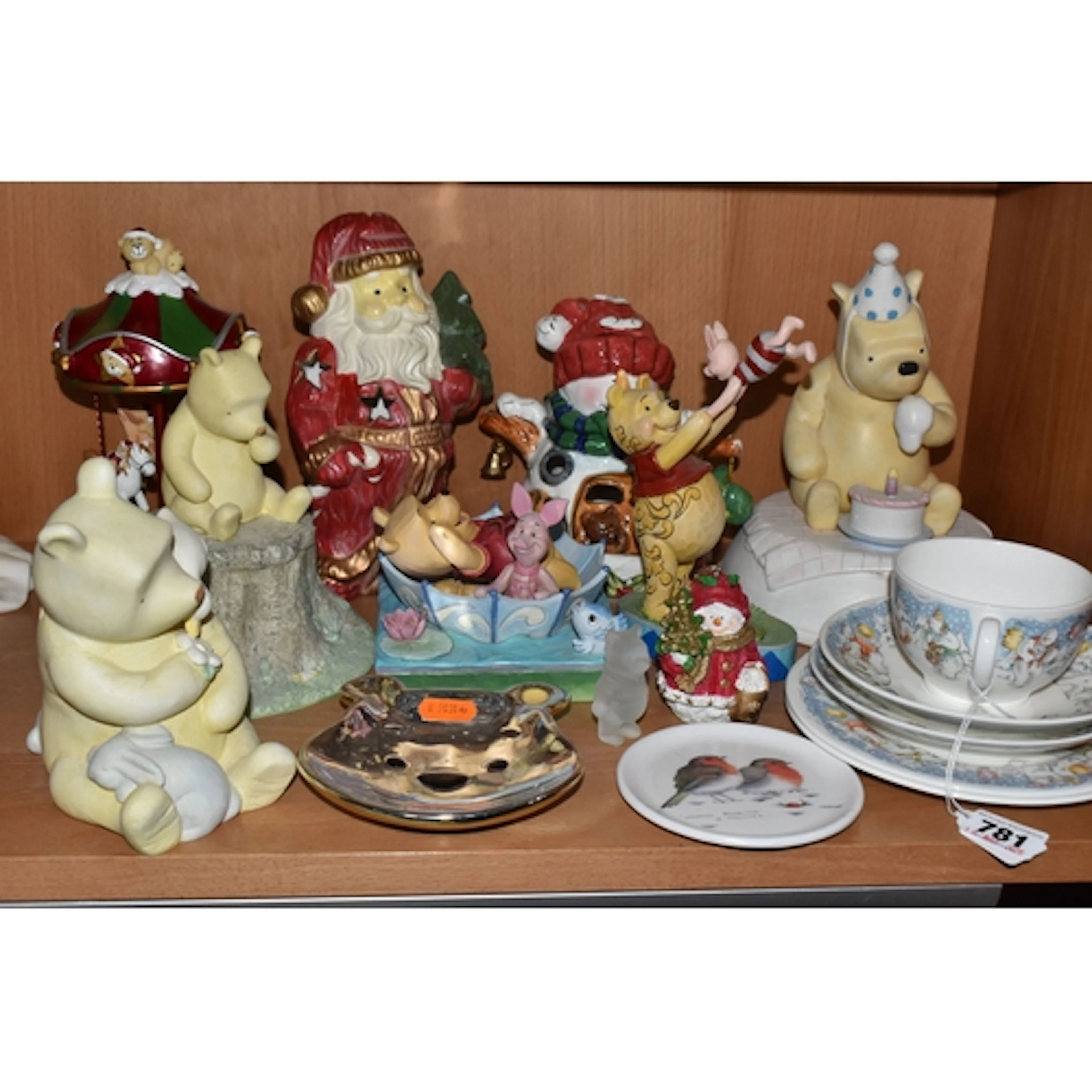 A GROUP OF WINNIE THE POOH AND CHRISTMAS ORNAMENTS to includ...