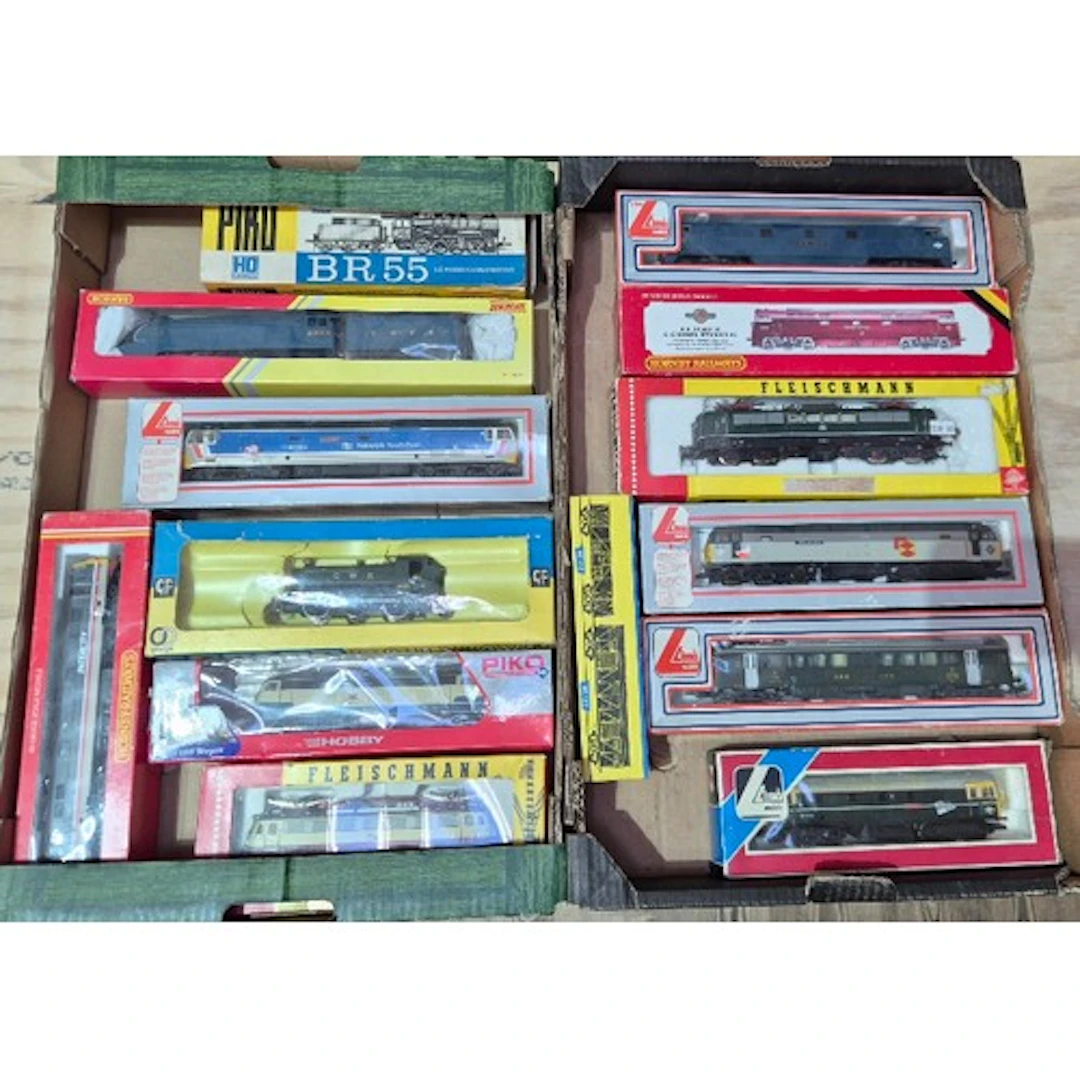 Two boxes of assorted model train items to include Fleischma...