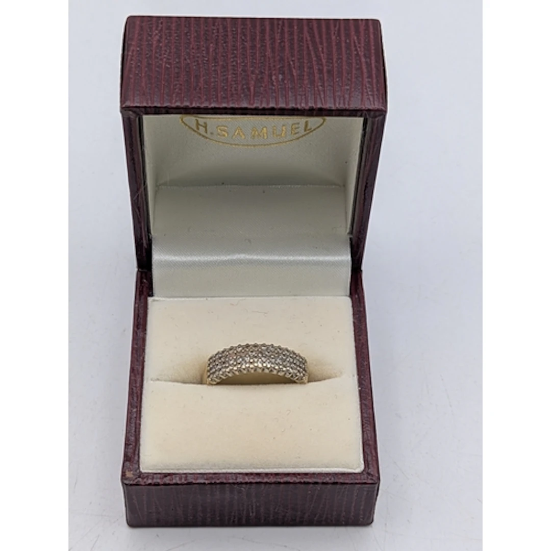 A 9ct yellow gold, multi-row pave set diamond ring, size O, ...