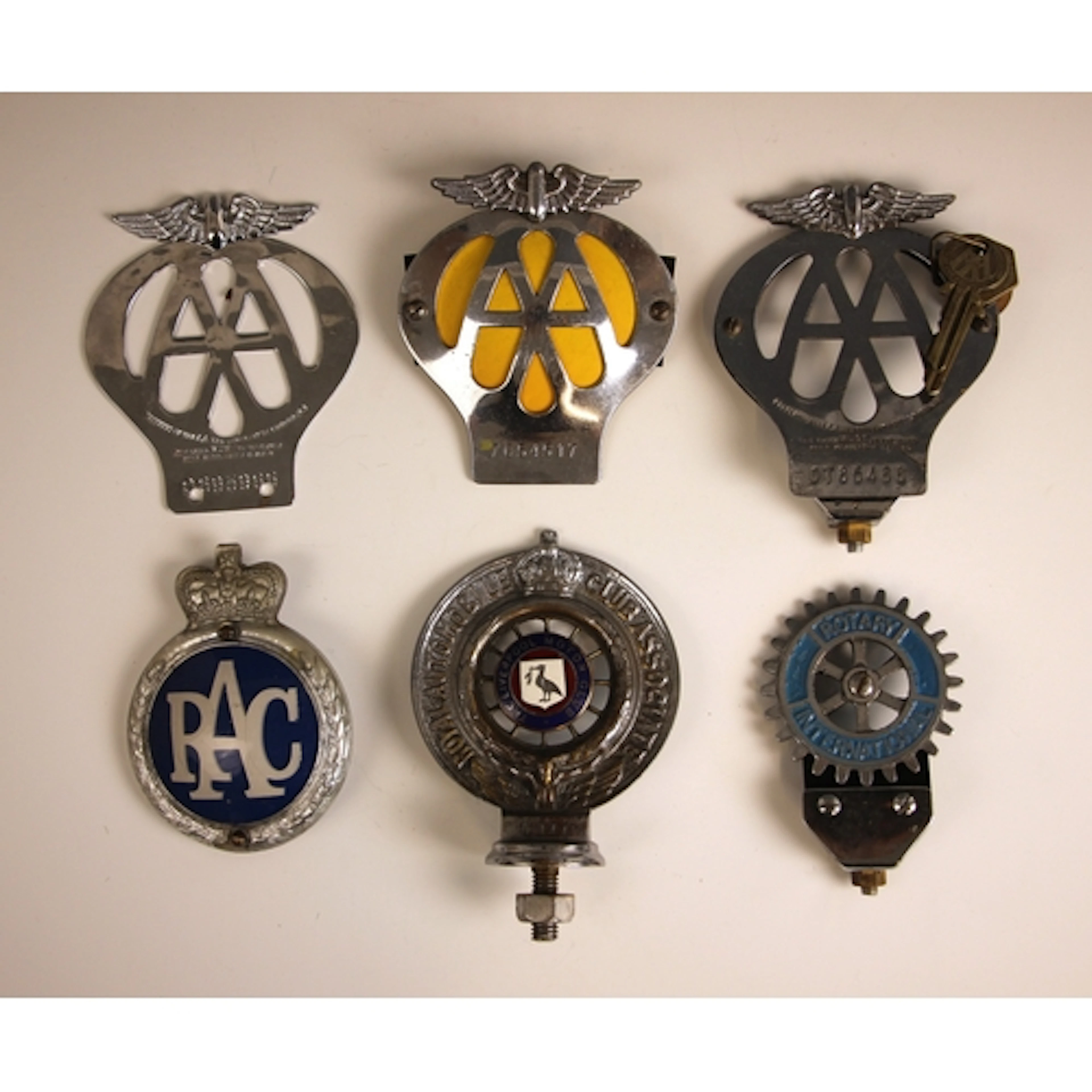 Three vintage AA car badges, two mid 20th century, one possi...