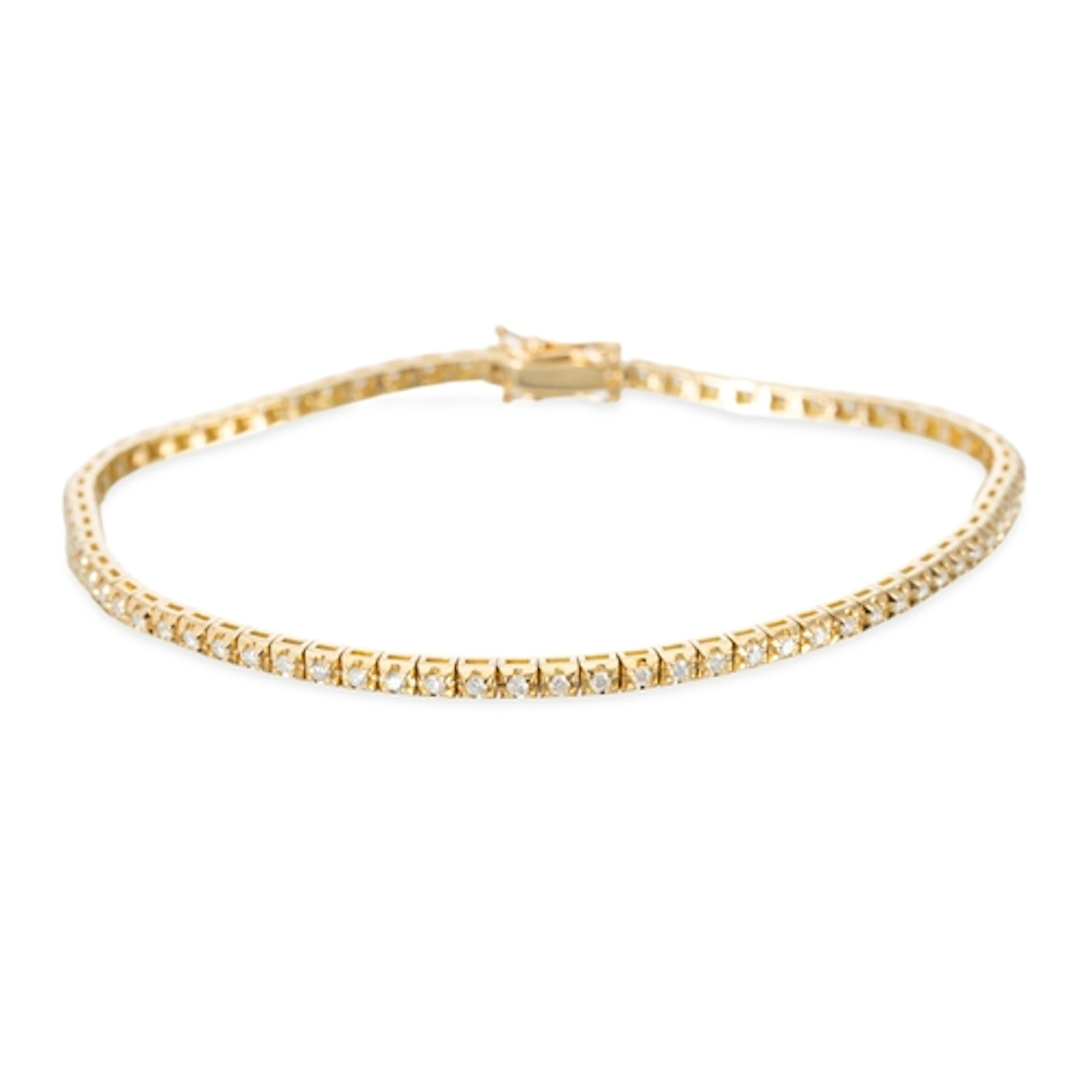 A DIAMOND SET LINE BRACELET, the round brilliant cut diamond...