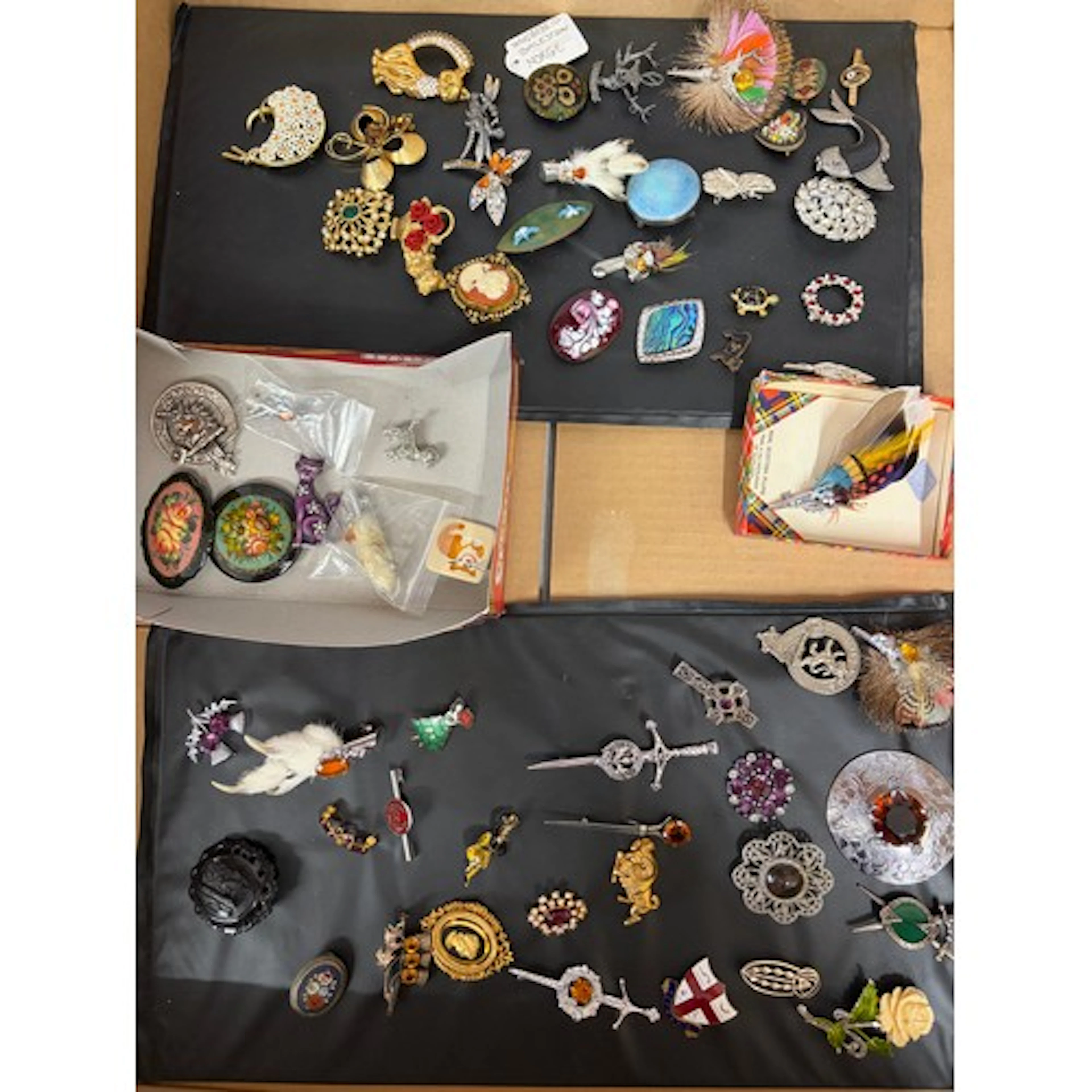 A collection of approximately 60 brooches to include micro m...