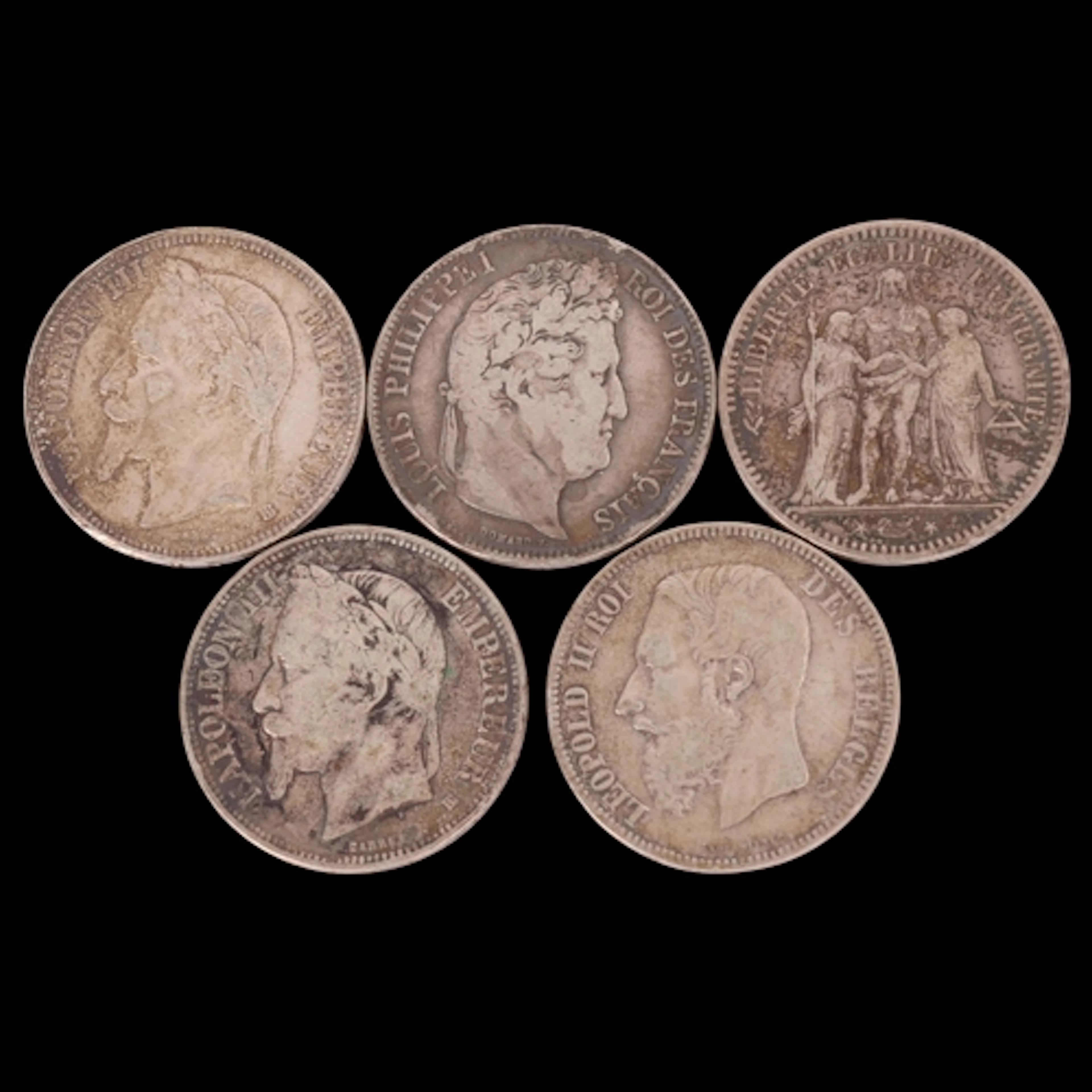 Five silver coins, including two French Napoleon III 5 Franc...