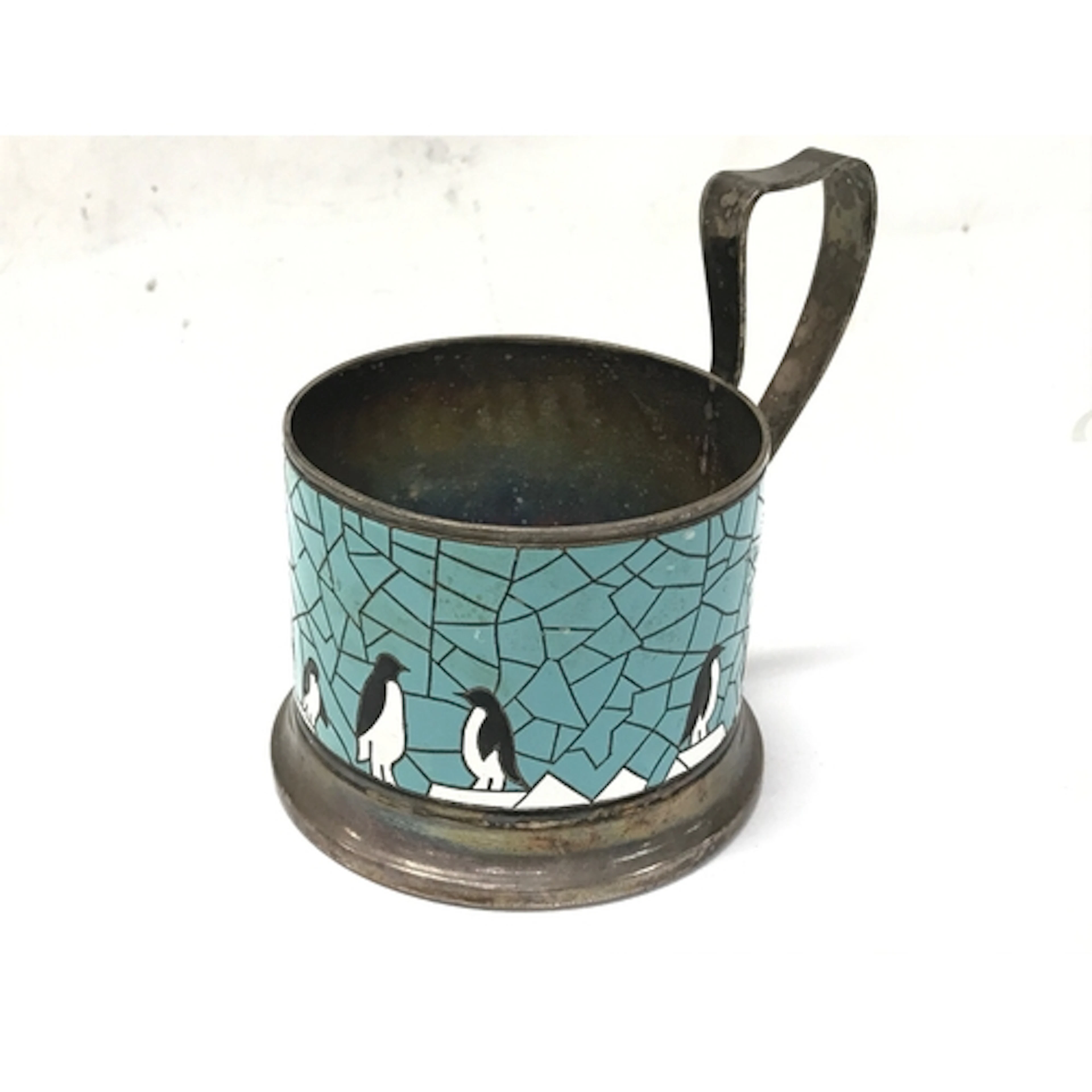 A vintage Russian enamel decorated tea glass holder (Podstak...