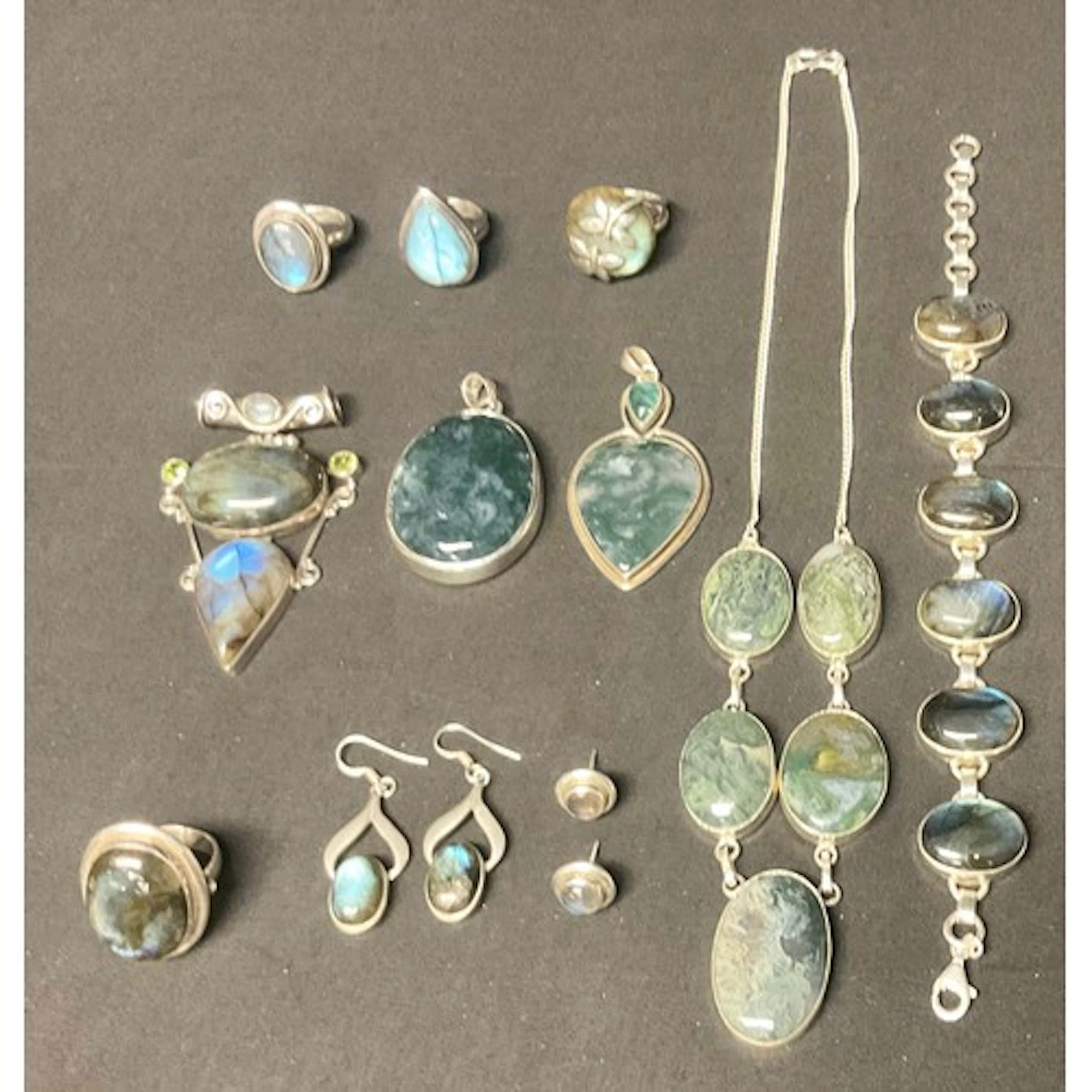 A labradorite silver mounted six cabochon bracelet, stamped ...
