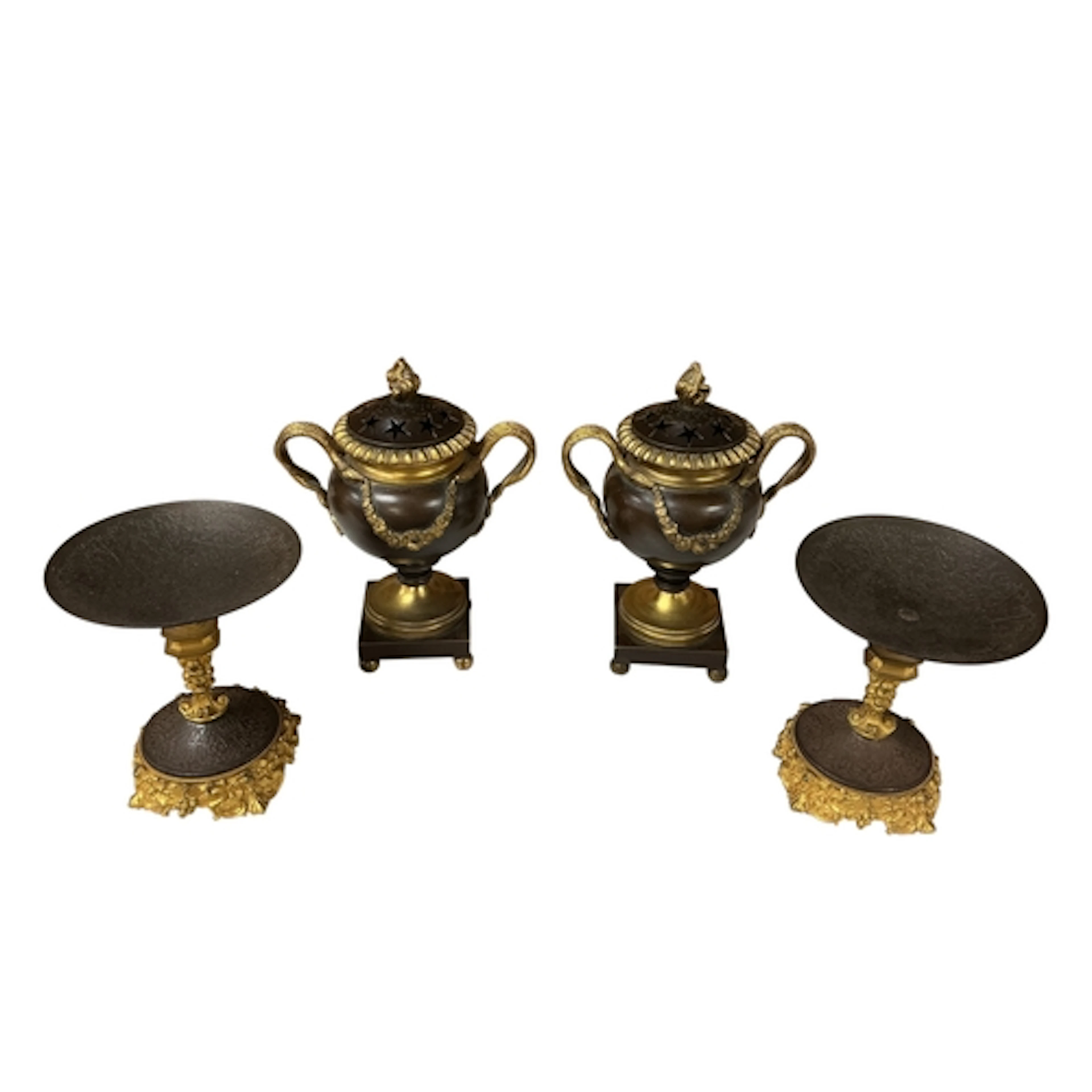 A pair of Regency ormolu and bronze pastille burners and cov...