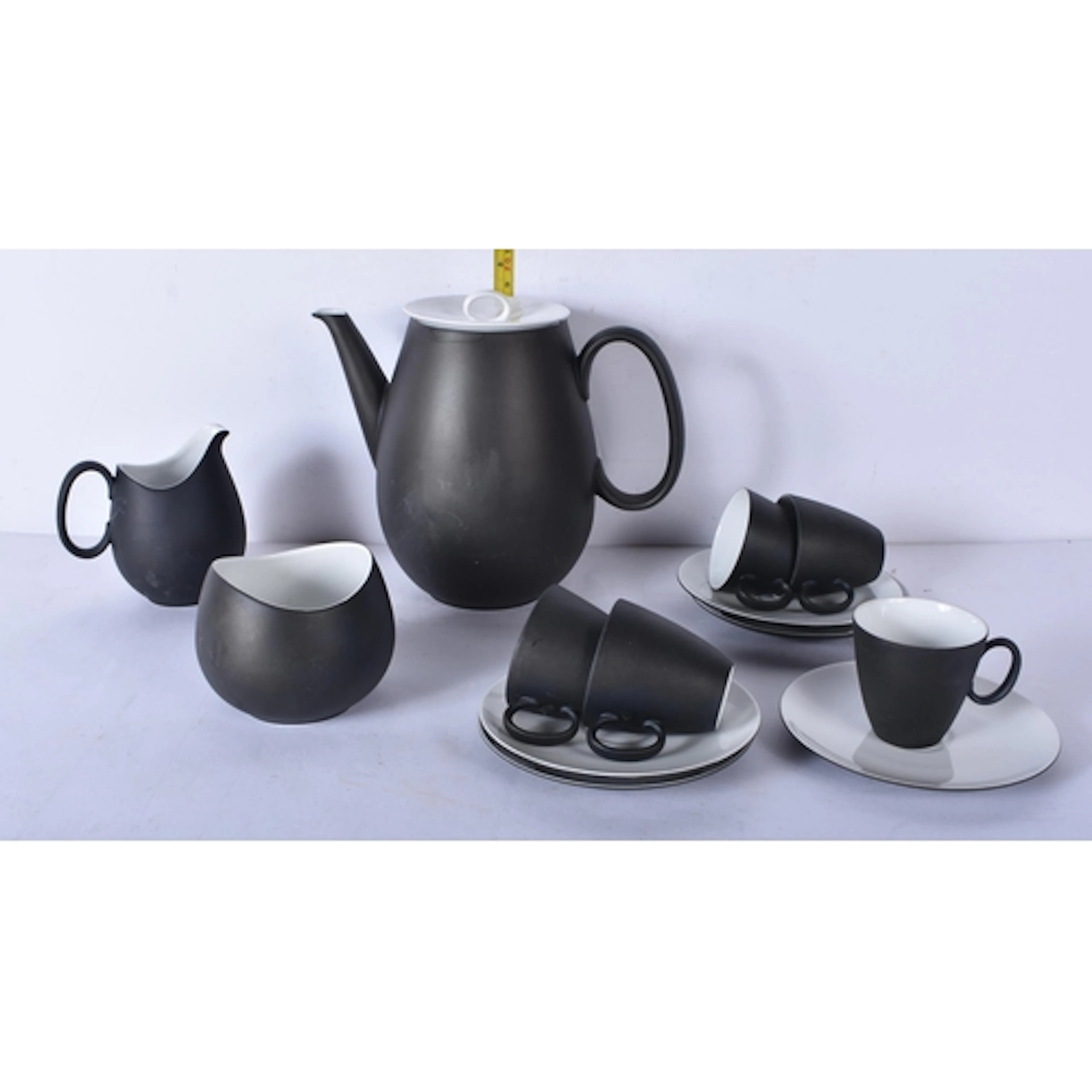 A Raymond Loewy charcoal coffee set, largest 19cm. (13)