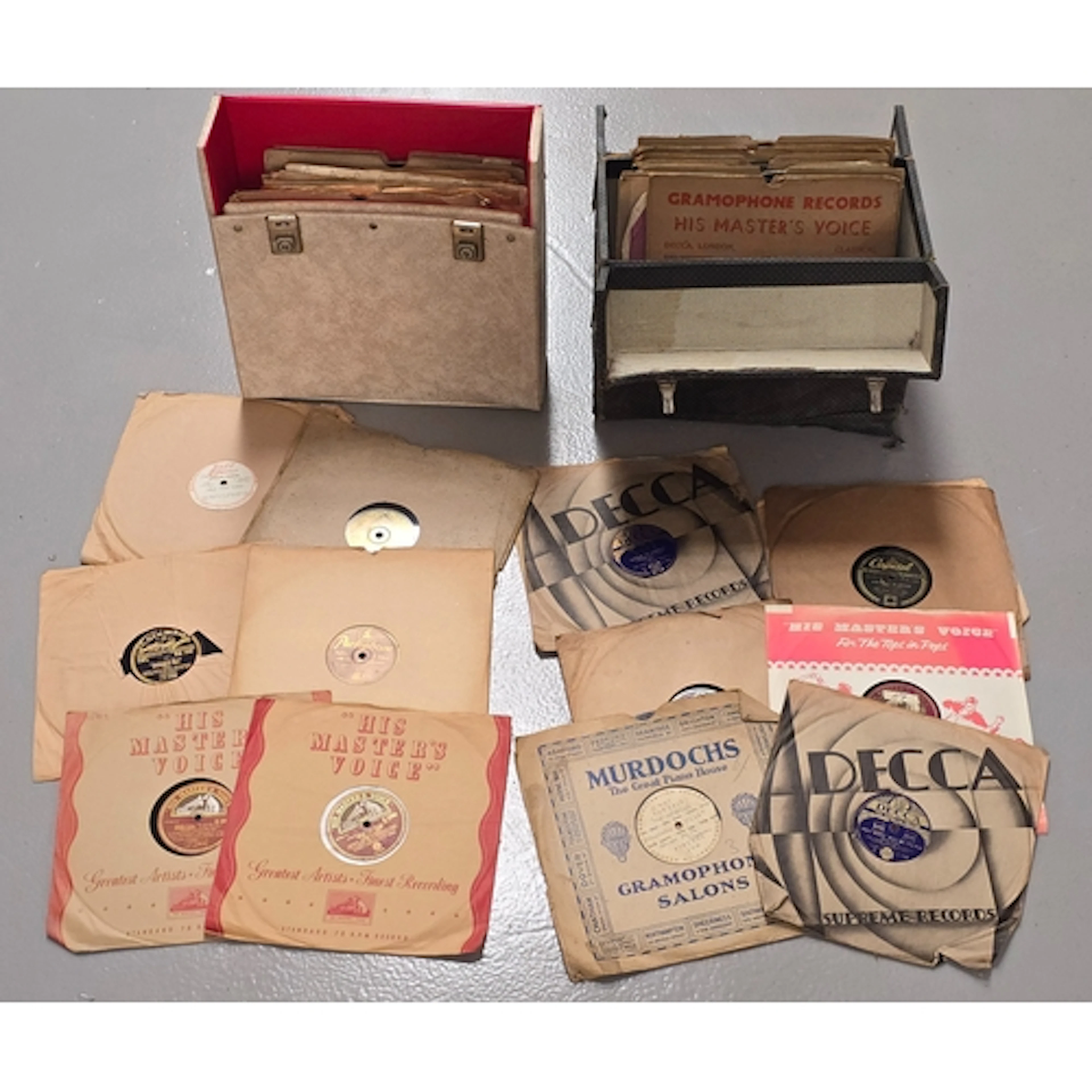 Two cases of jazz/swing 78rpm gramophone records. Artists "C...