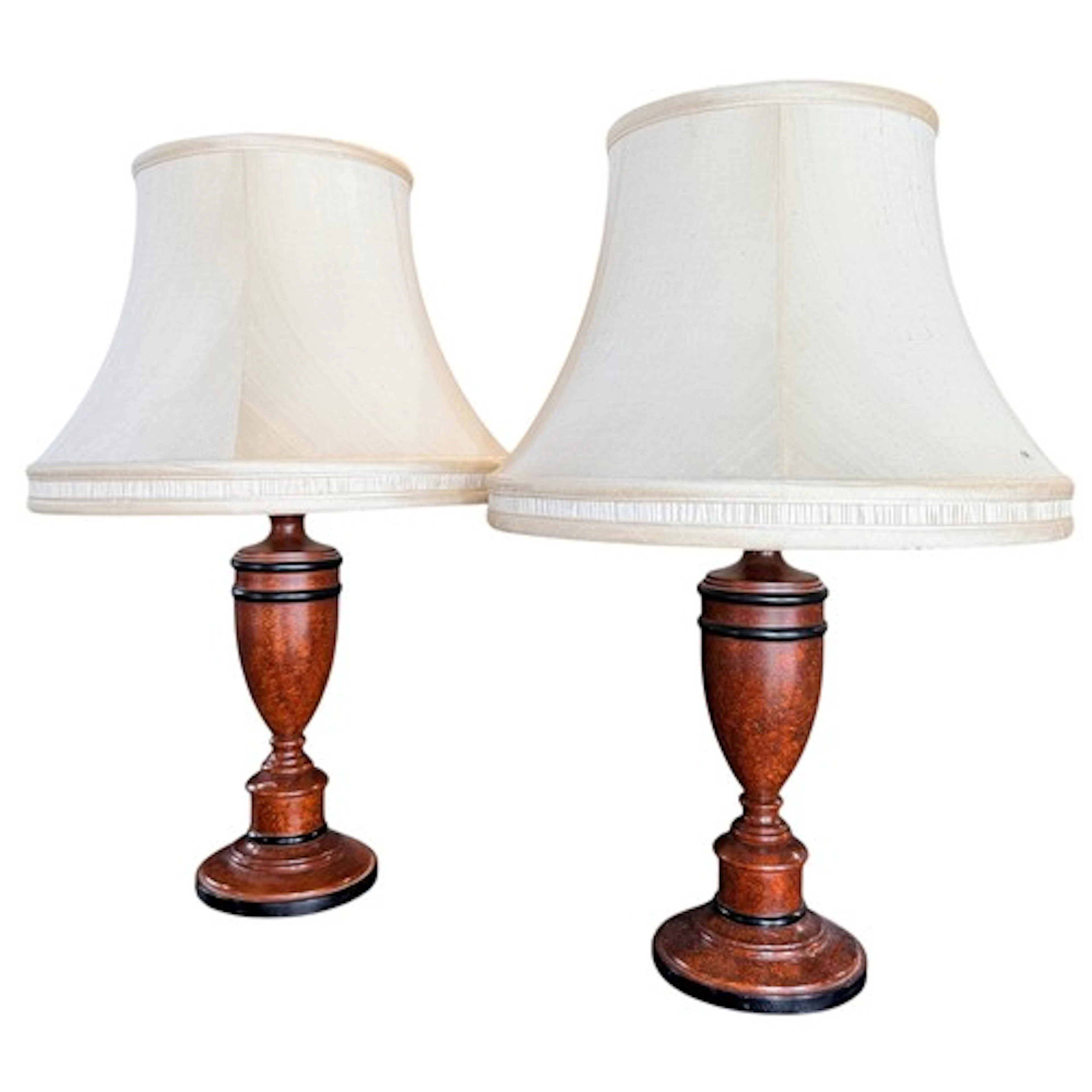A pair of turned wooden desk lamps and shades