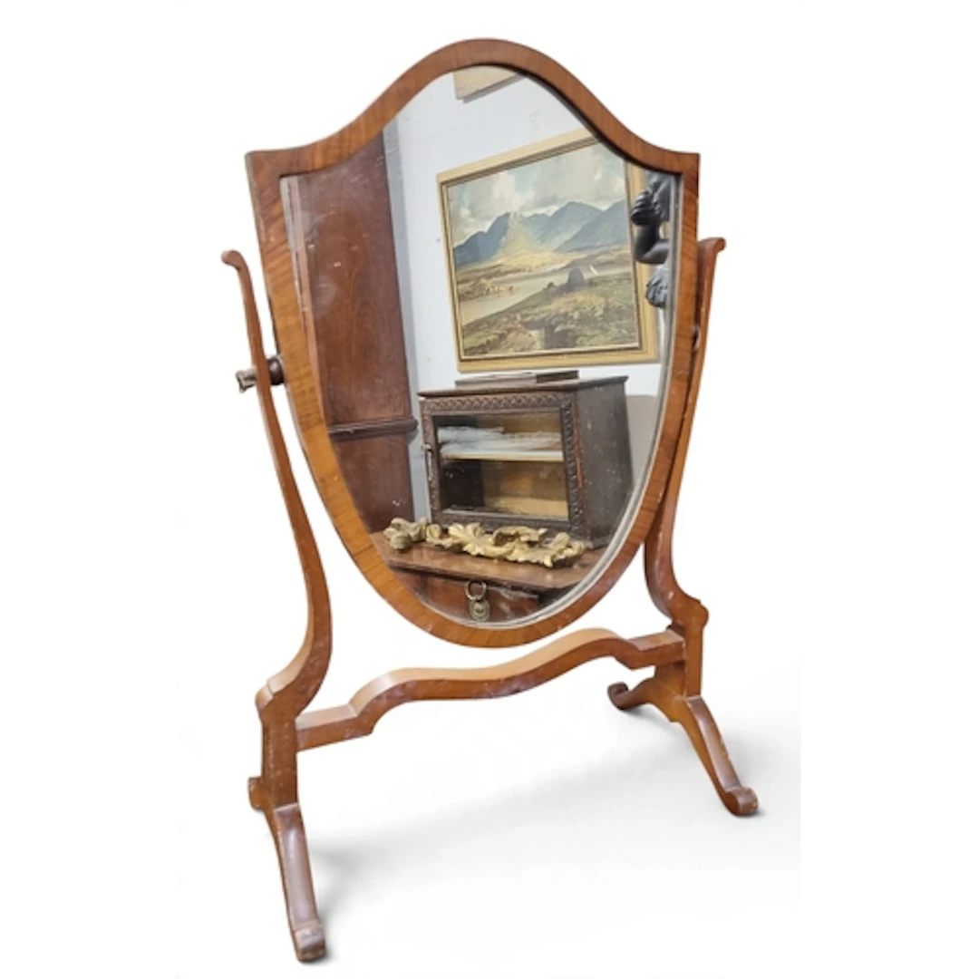 A 19th Century Mahogany shield shape Crutch Mirror. W 41 x H...