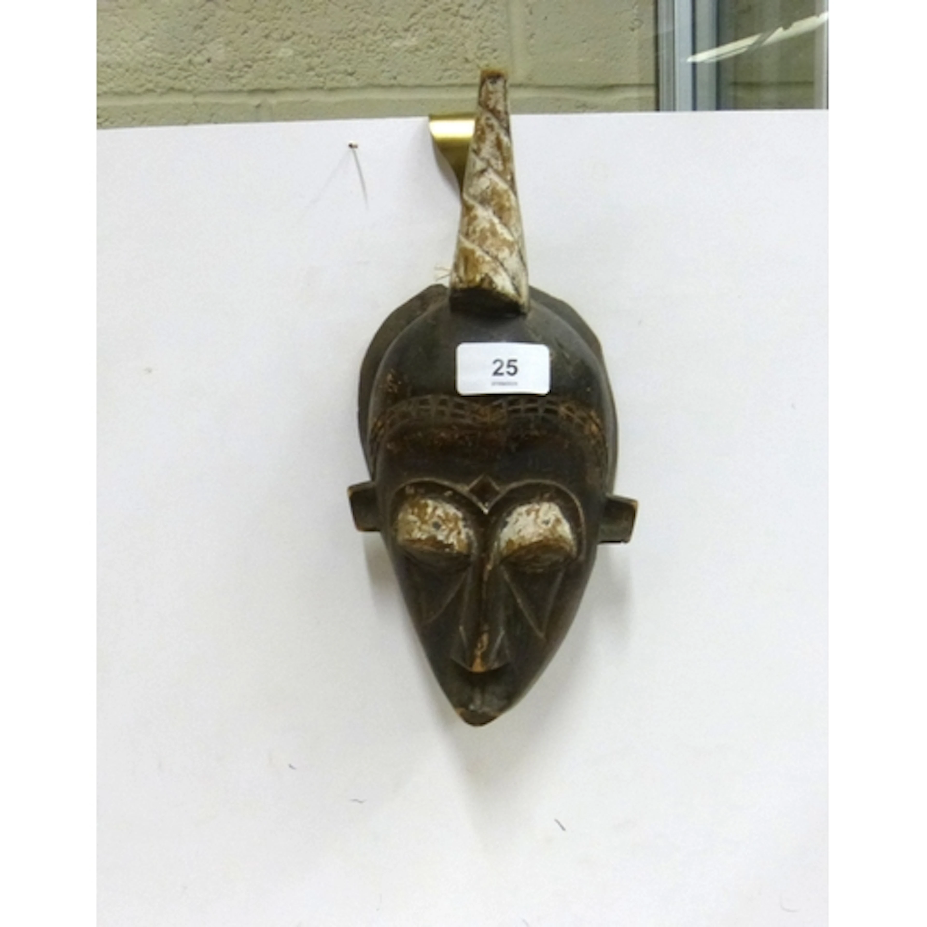 West African tribal mask resembling art style from Baule or ...