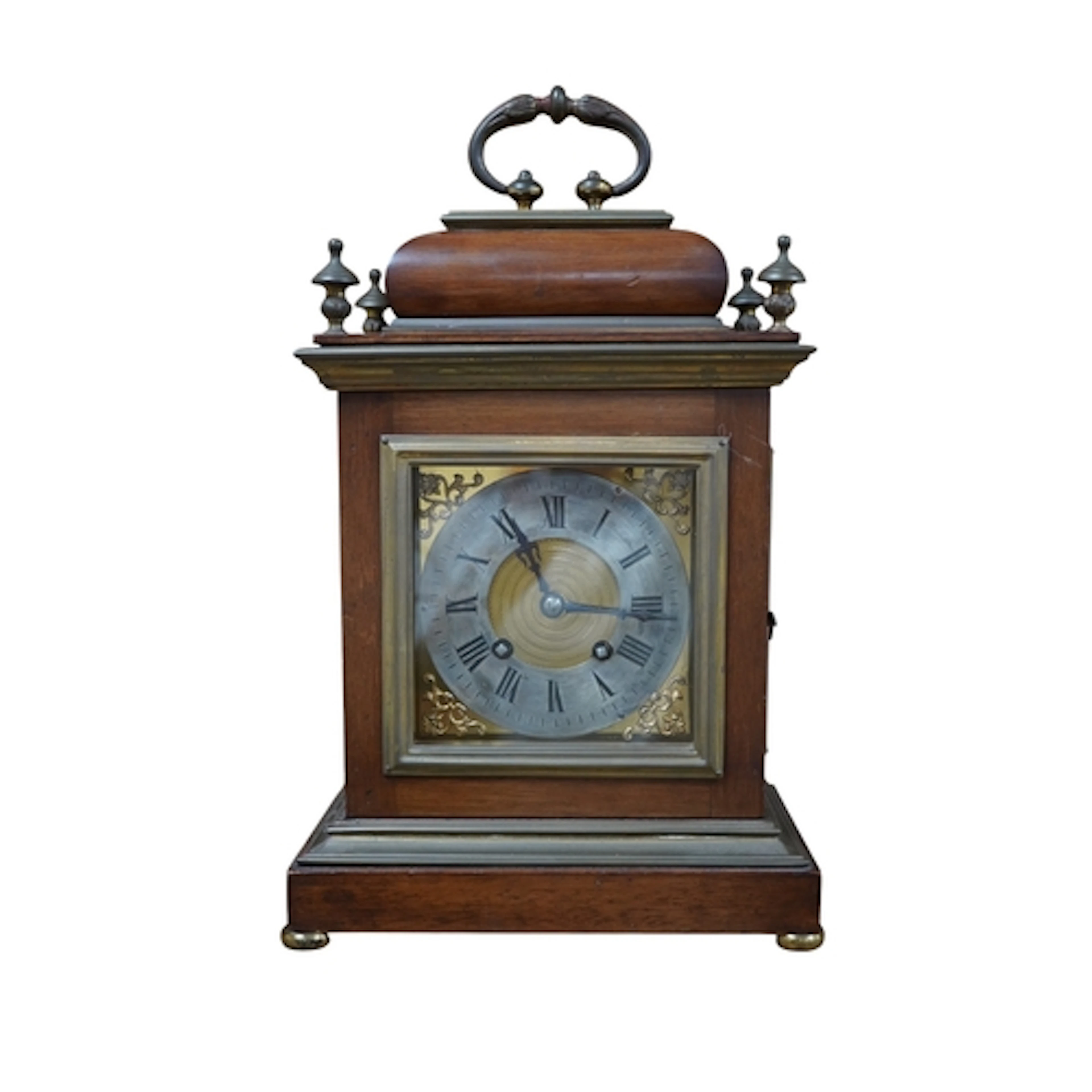An 18th century-style bracket clock with silvered dial, stri...