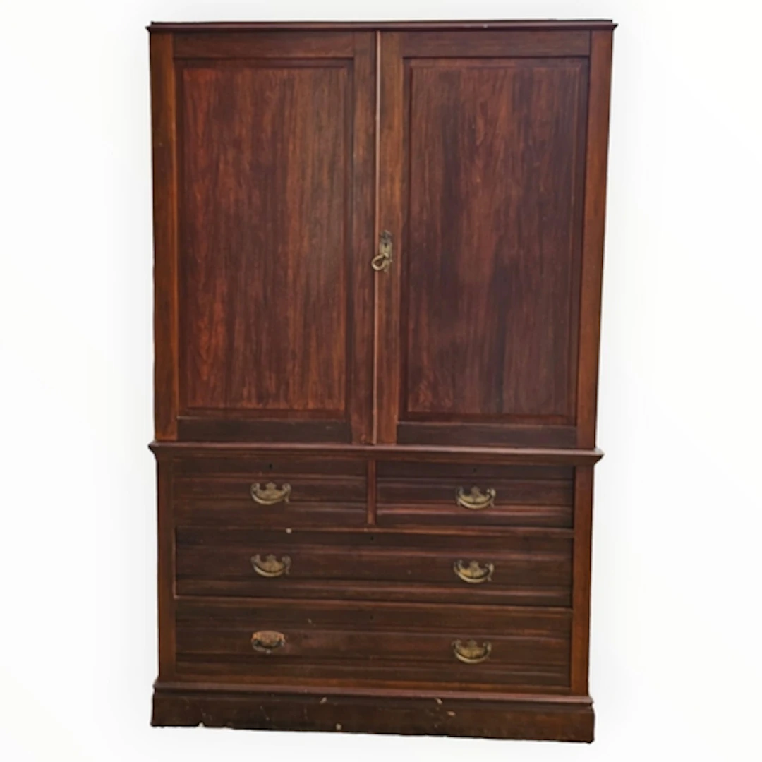 A LATE VICTORIAN MAHOGANY LINEN PRESS With two doors enclosi...