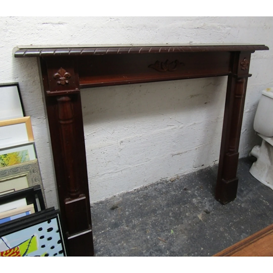 Mahogany Mantle Piece with Applied Fleur de Lis Carved Decor...
