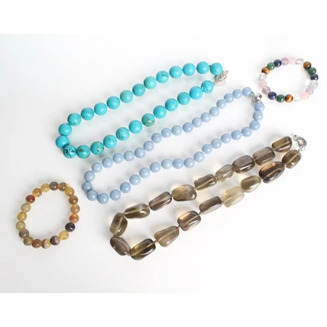 Five mixed gemstone and sterling silver necklaces and bracel...