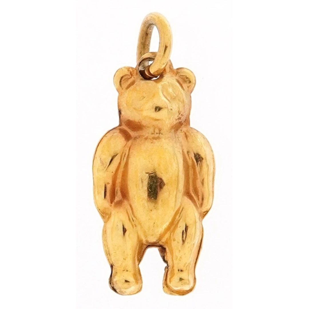 9ct gold charm in the form of a teddy bear, 1.5cm high, 0.4g...