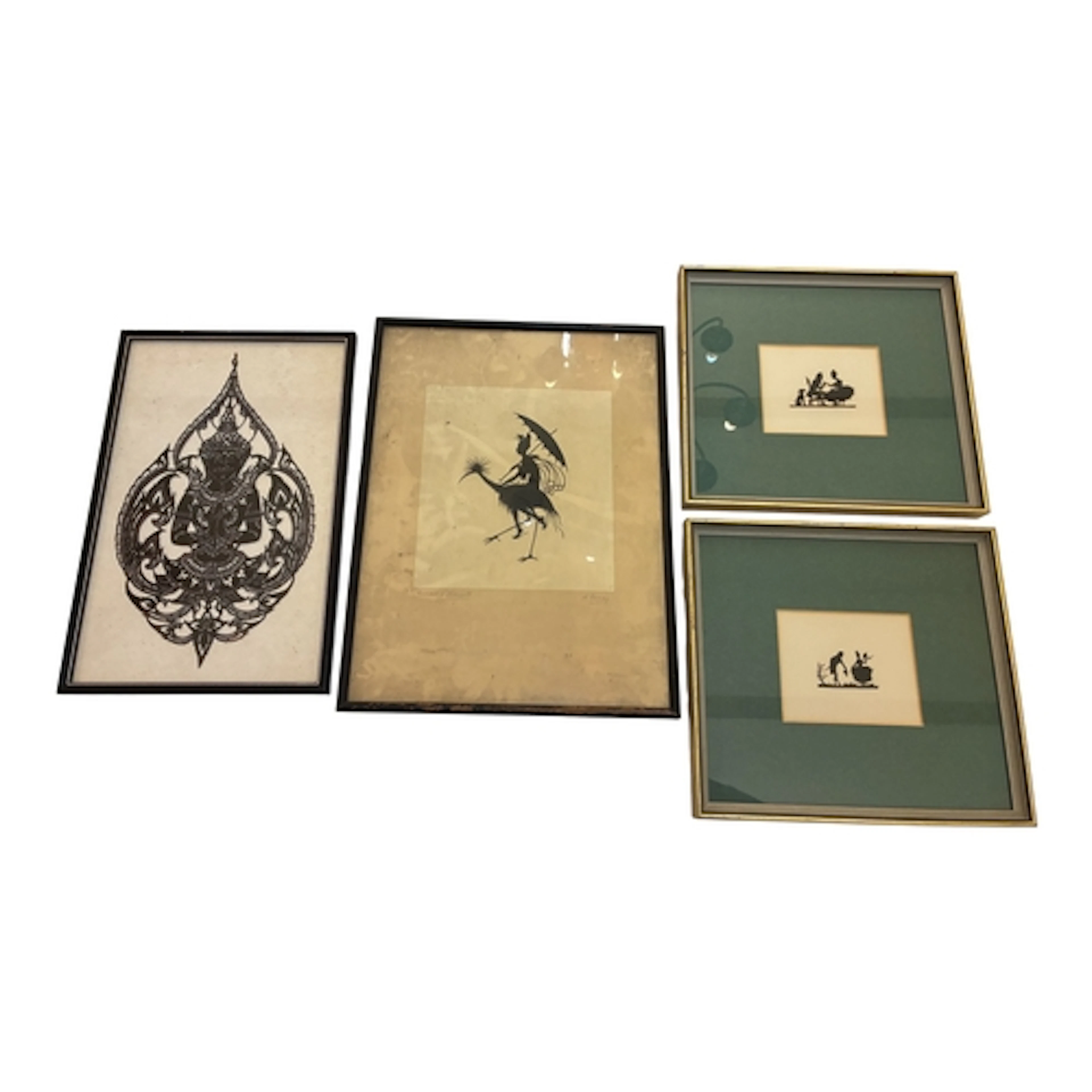 four framed silhouettes, to include miniature Victorian pape...