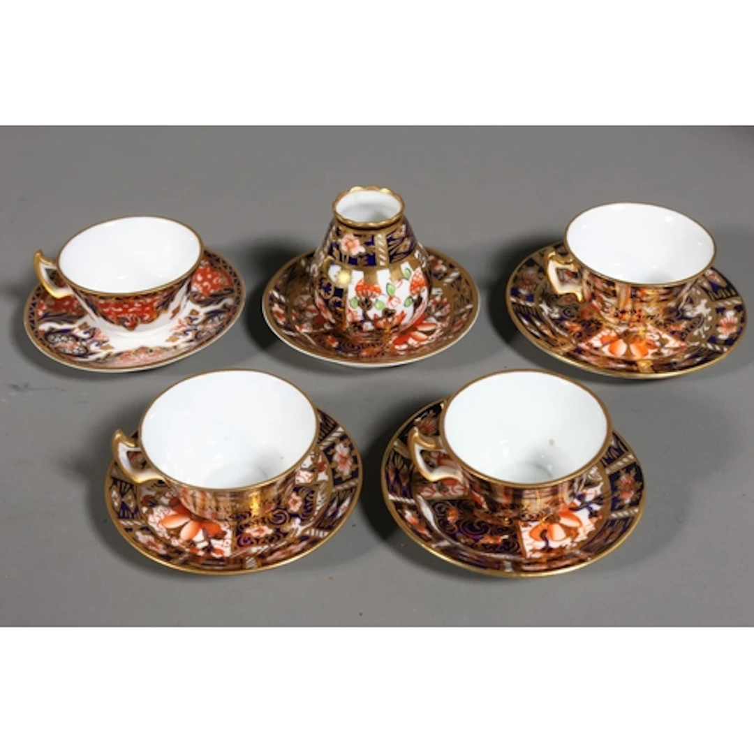 Royal Crown Derby Imari pattern miniature teacups and saucer...