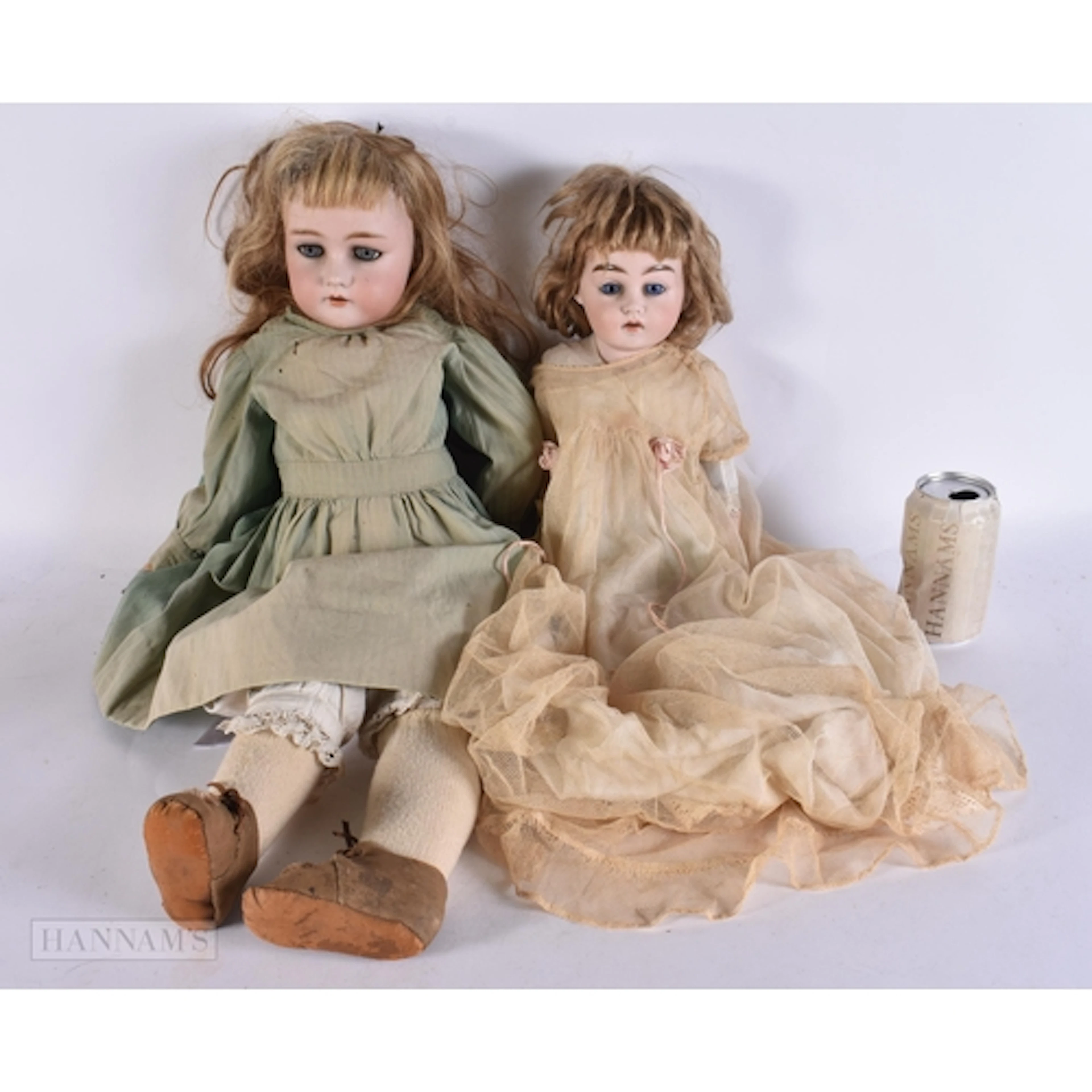 TWO ANTIQUE BISQUE HEAD PORCELAIN DOLLS. 65 cm long. (2)