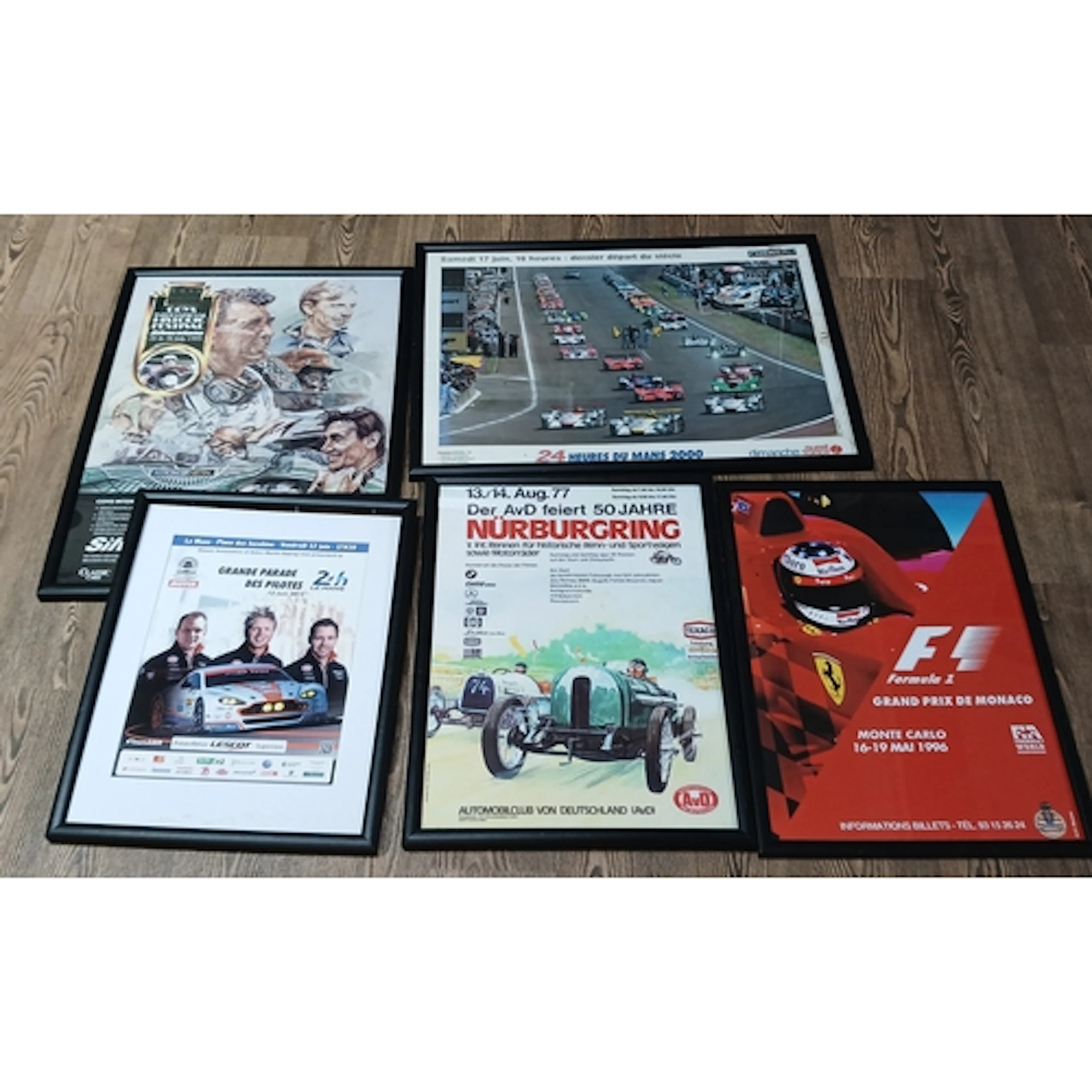 A group of five assorted motor racing posters, various sizes...