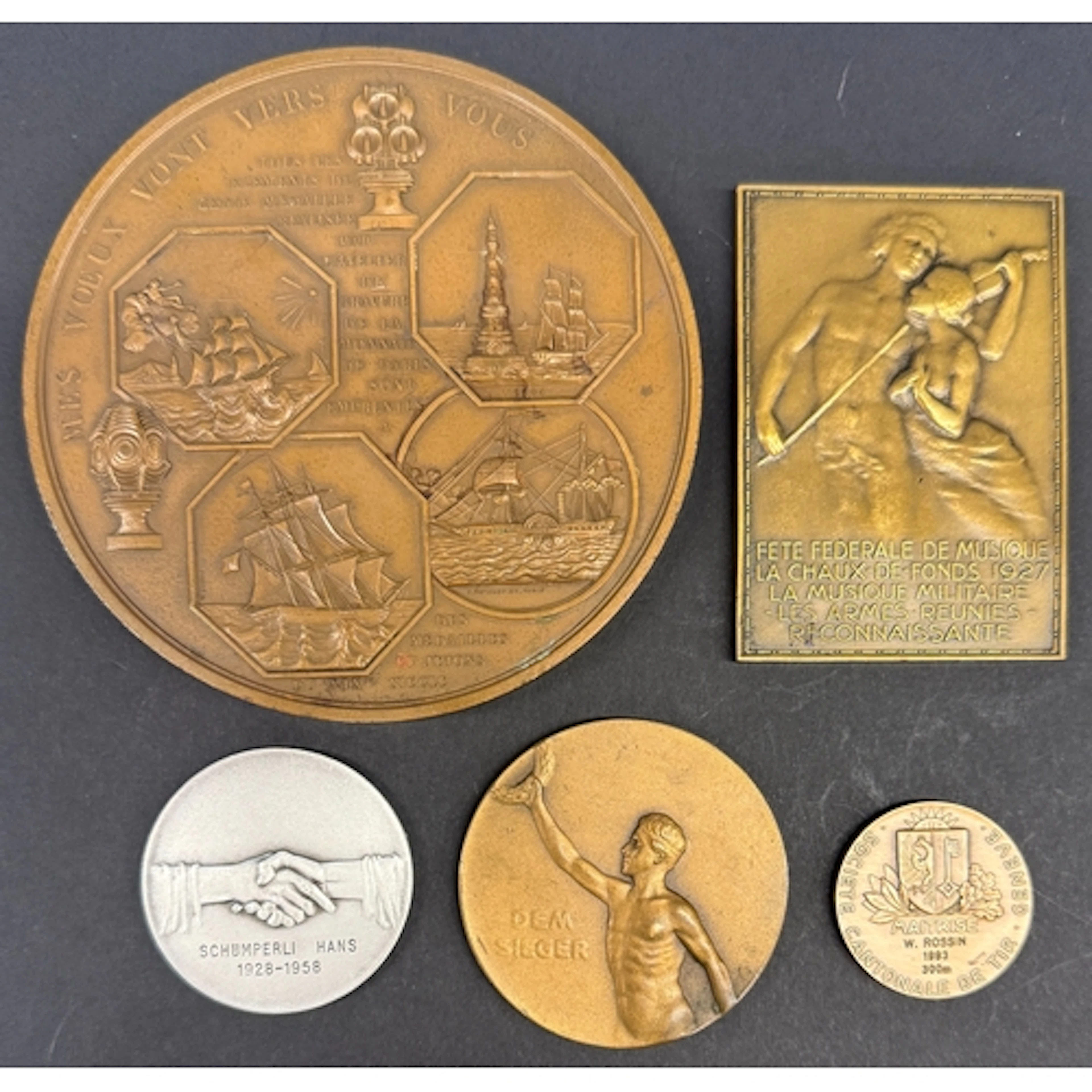 A group of five Swiss commemorative and award medals, includ...