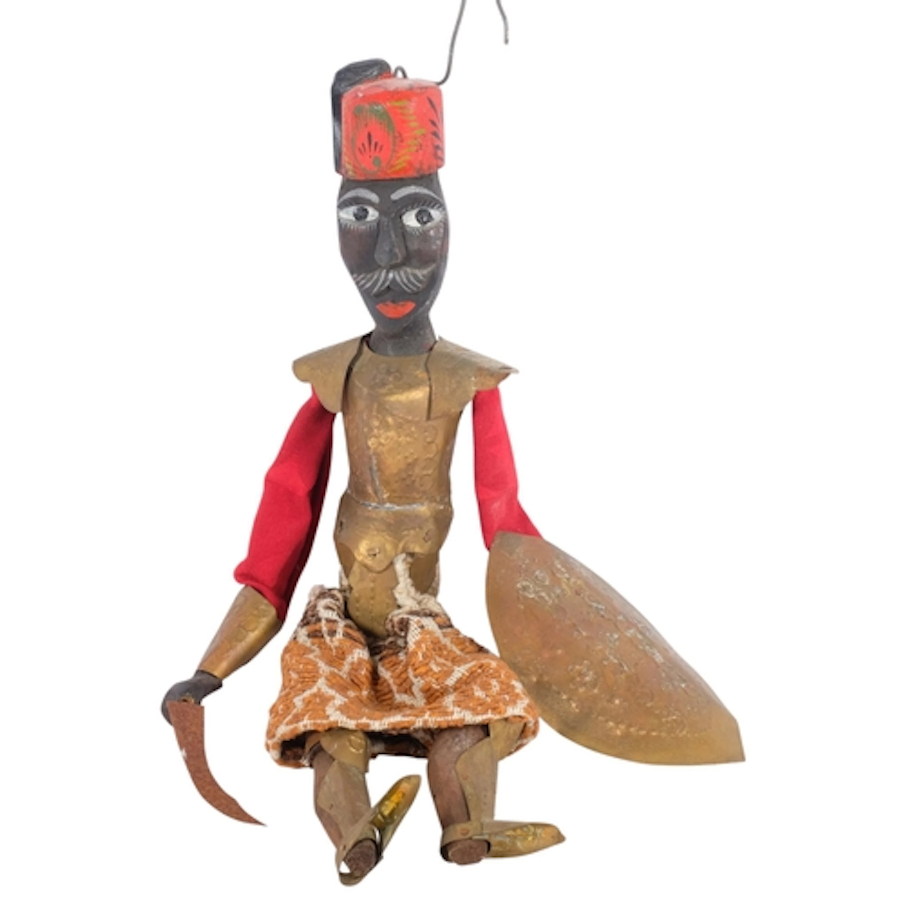 A Berber style puppet, with carved and painted body, pressed...