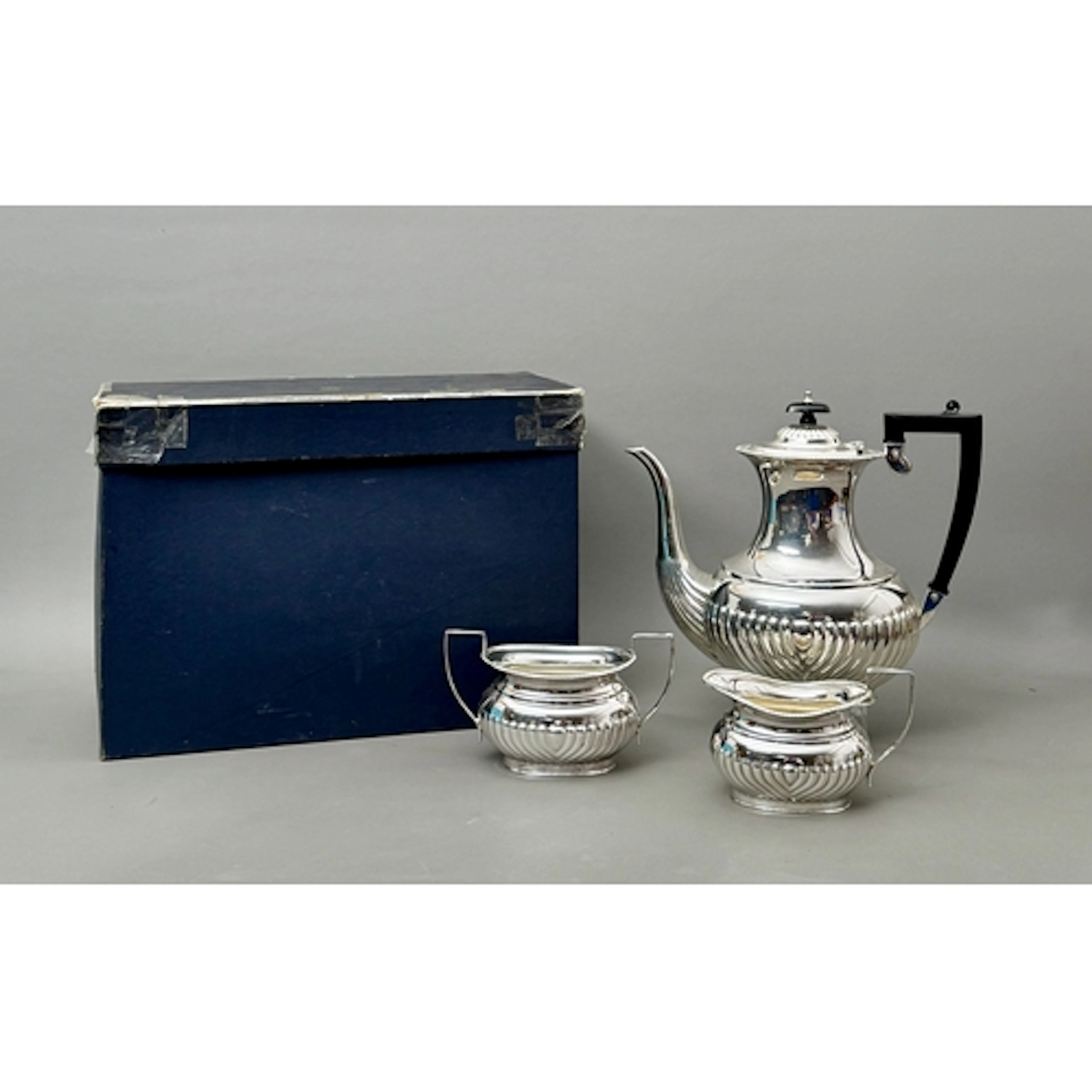 A three piece silver plated coffee service - in the Regency ...
