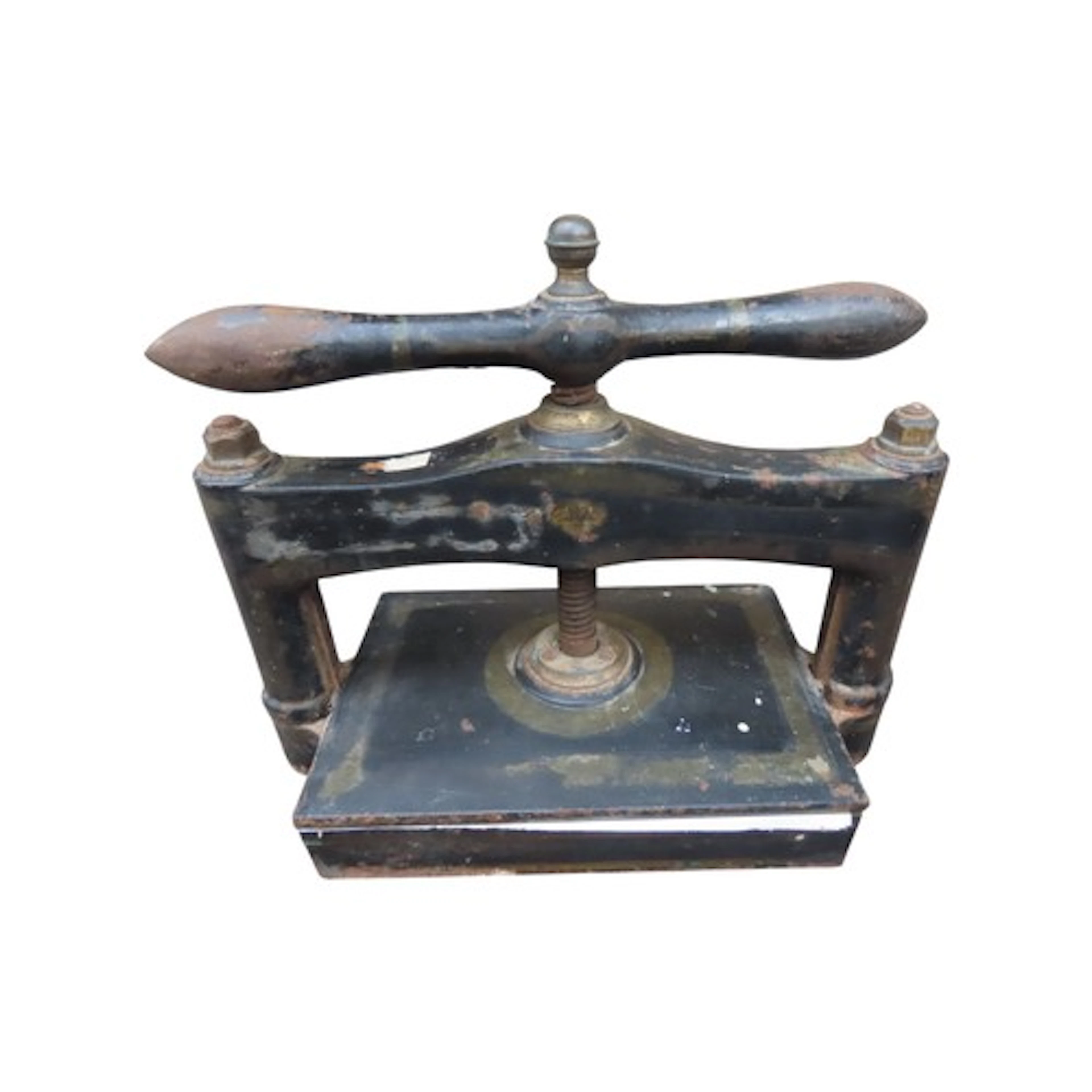 A Victorian cast iron book press with central screw thread a...
