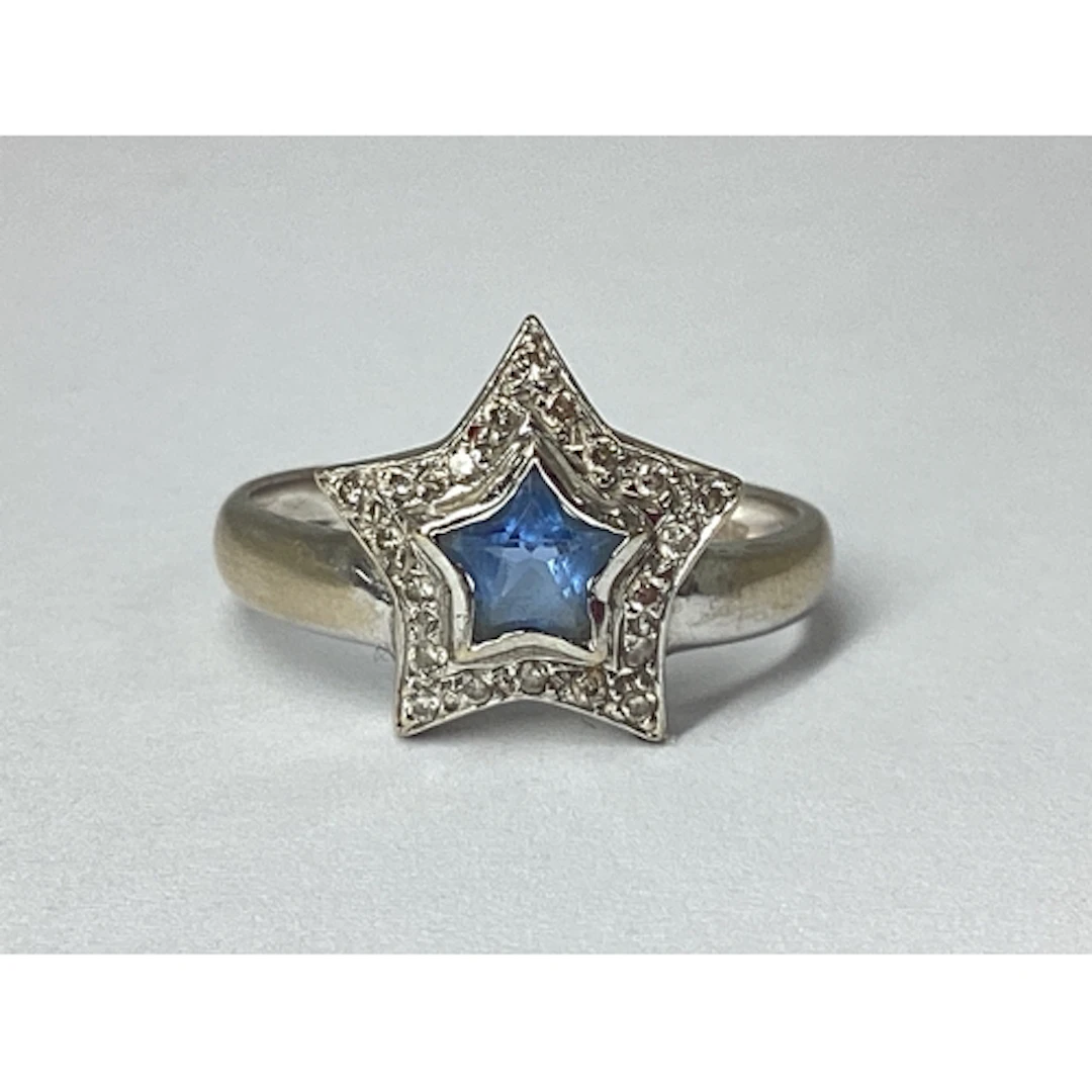 A Modern Sapphire and Diamond Set Dress Ring, of star design...