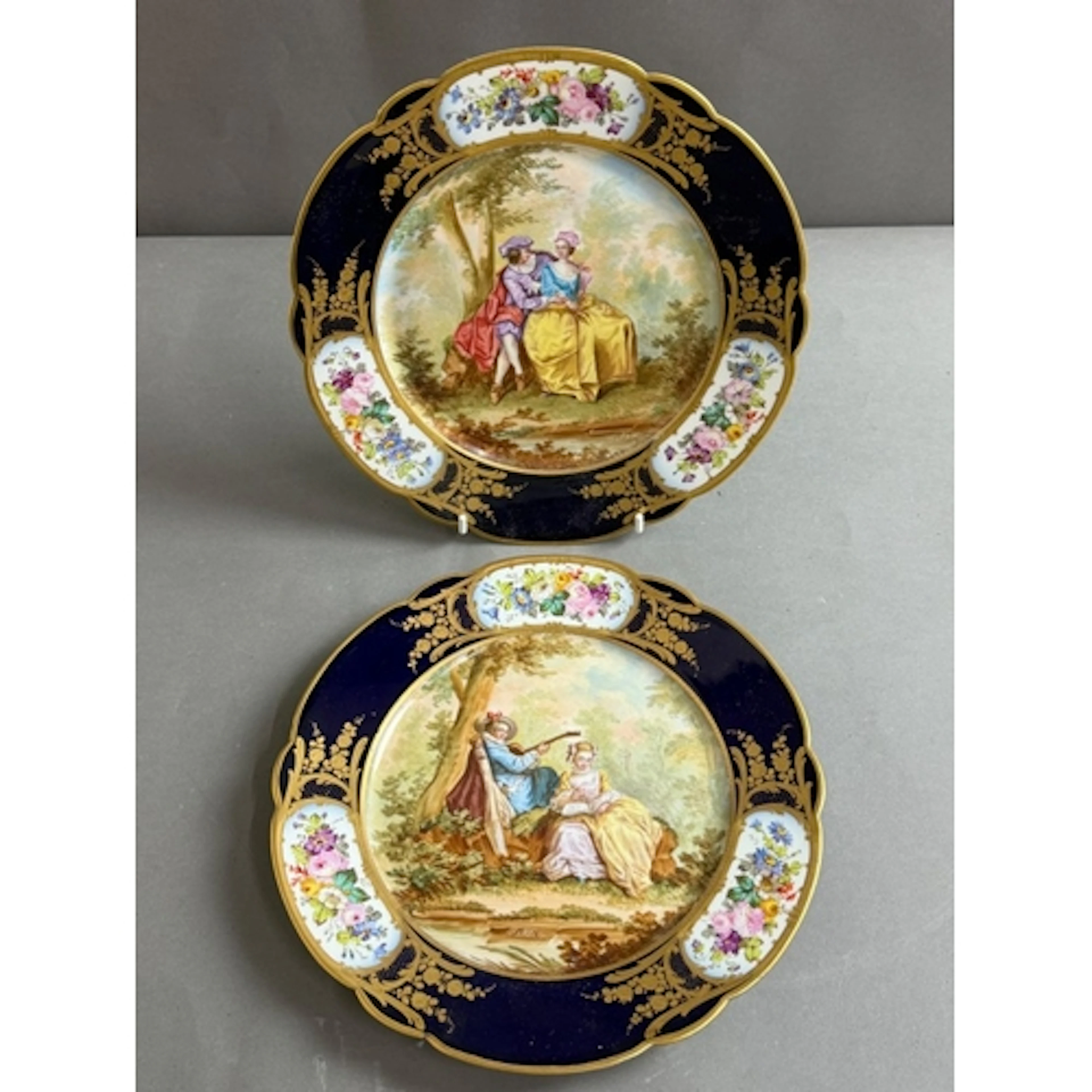 Two Sevres style plates, both signed