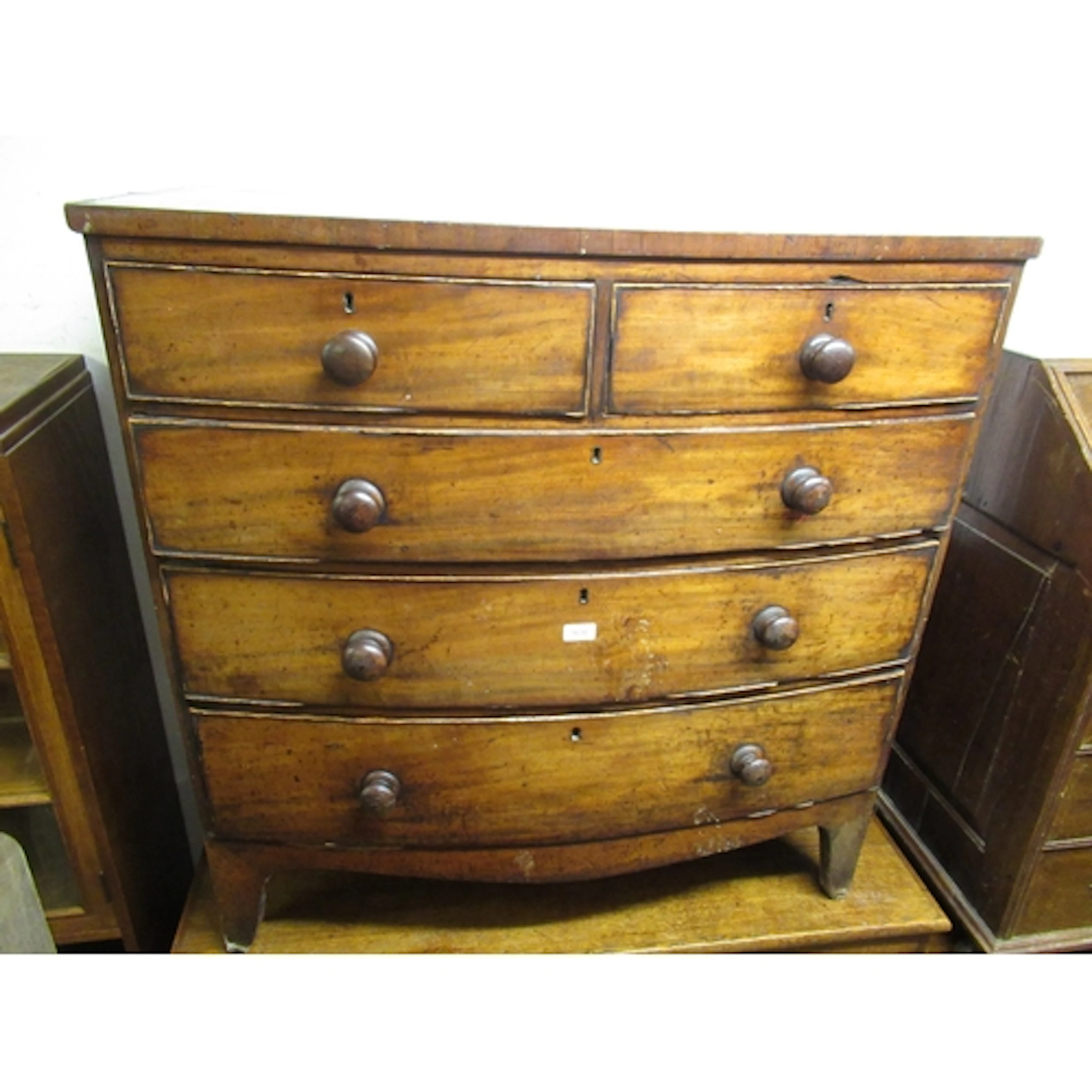 Victorian mahogany bow-front chest of two short and three lo...