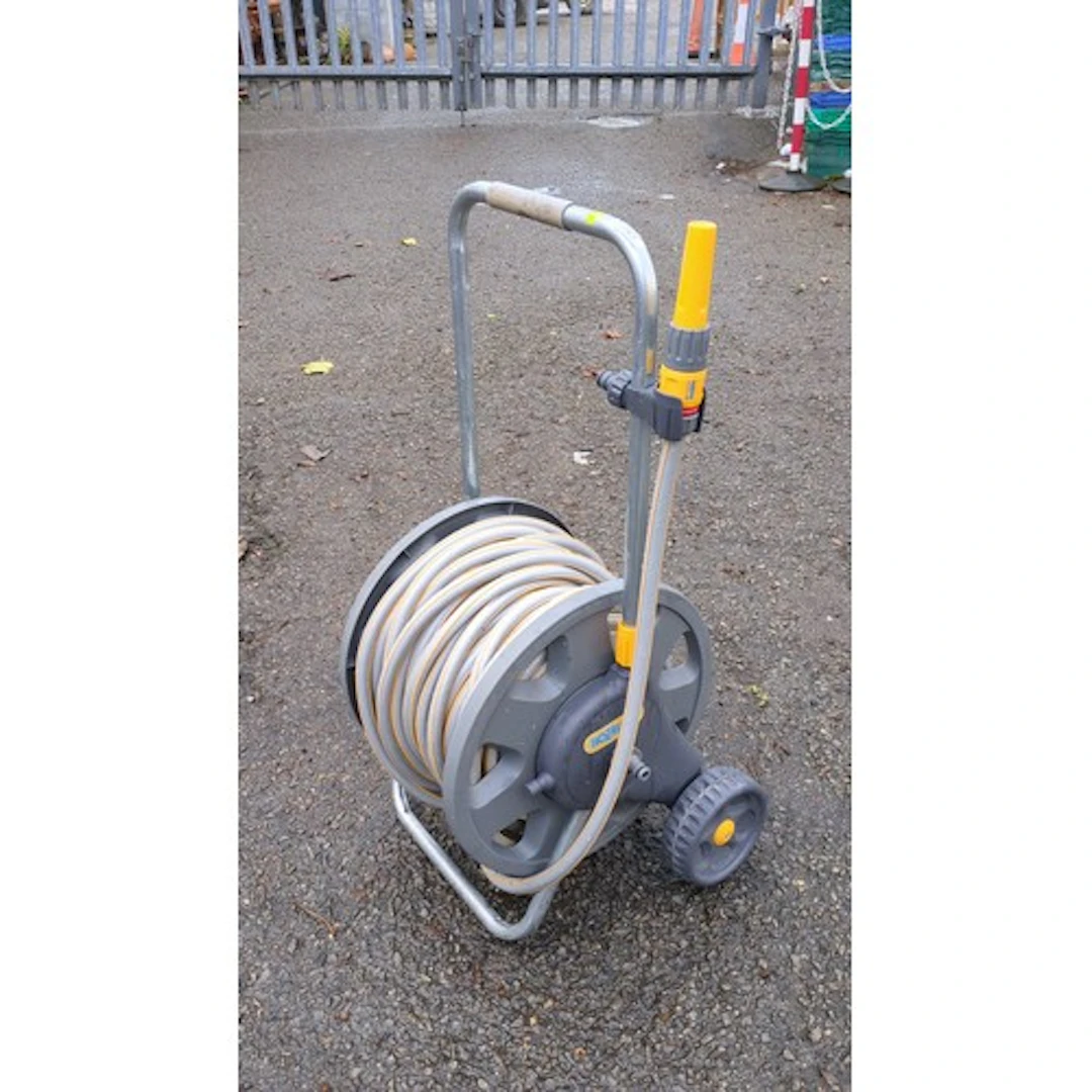 Hozelock wheeled garden hose reel on a tubular metal trolley...