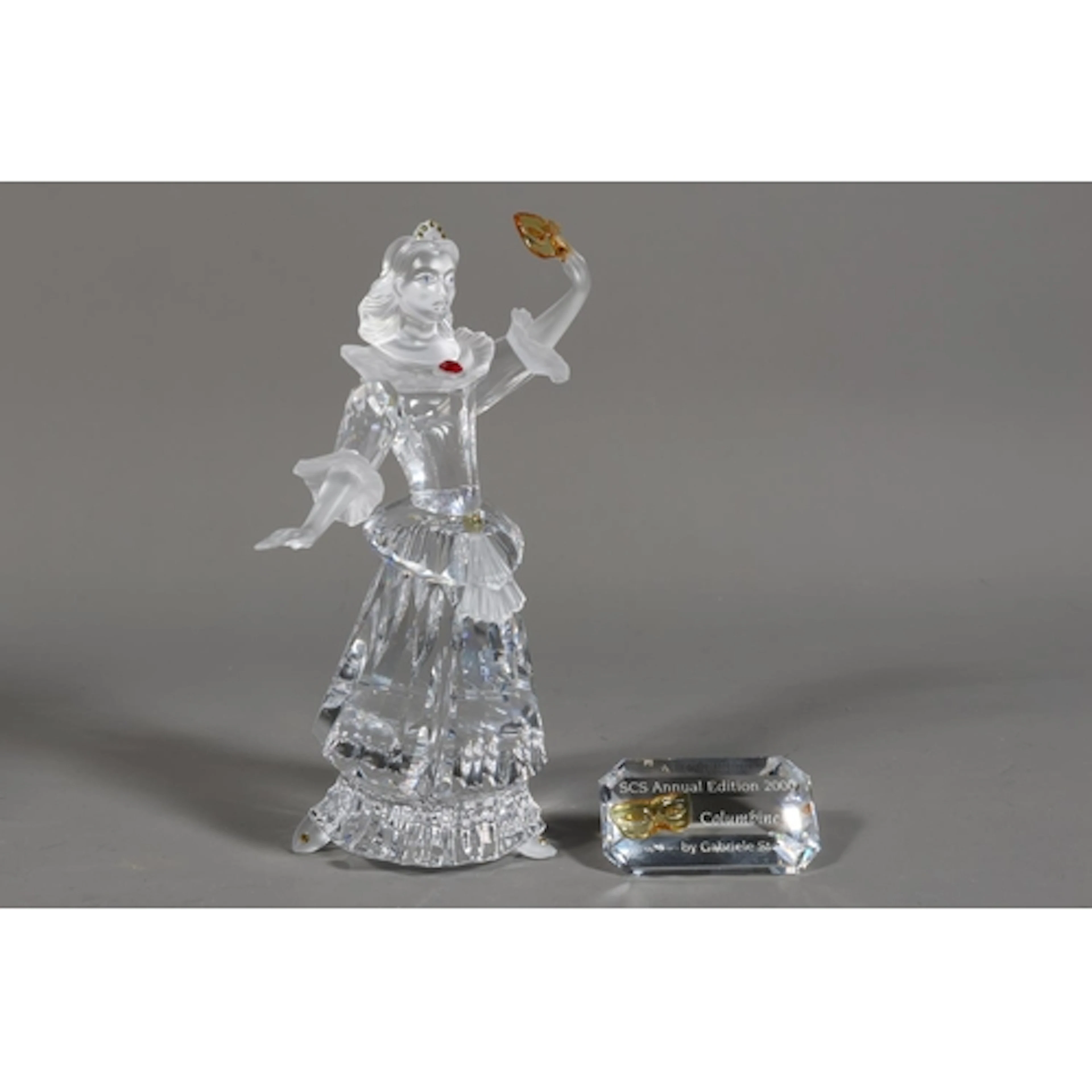 Boxed Swarovski crystal glass sculpture of Masquerade Columb...