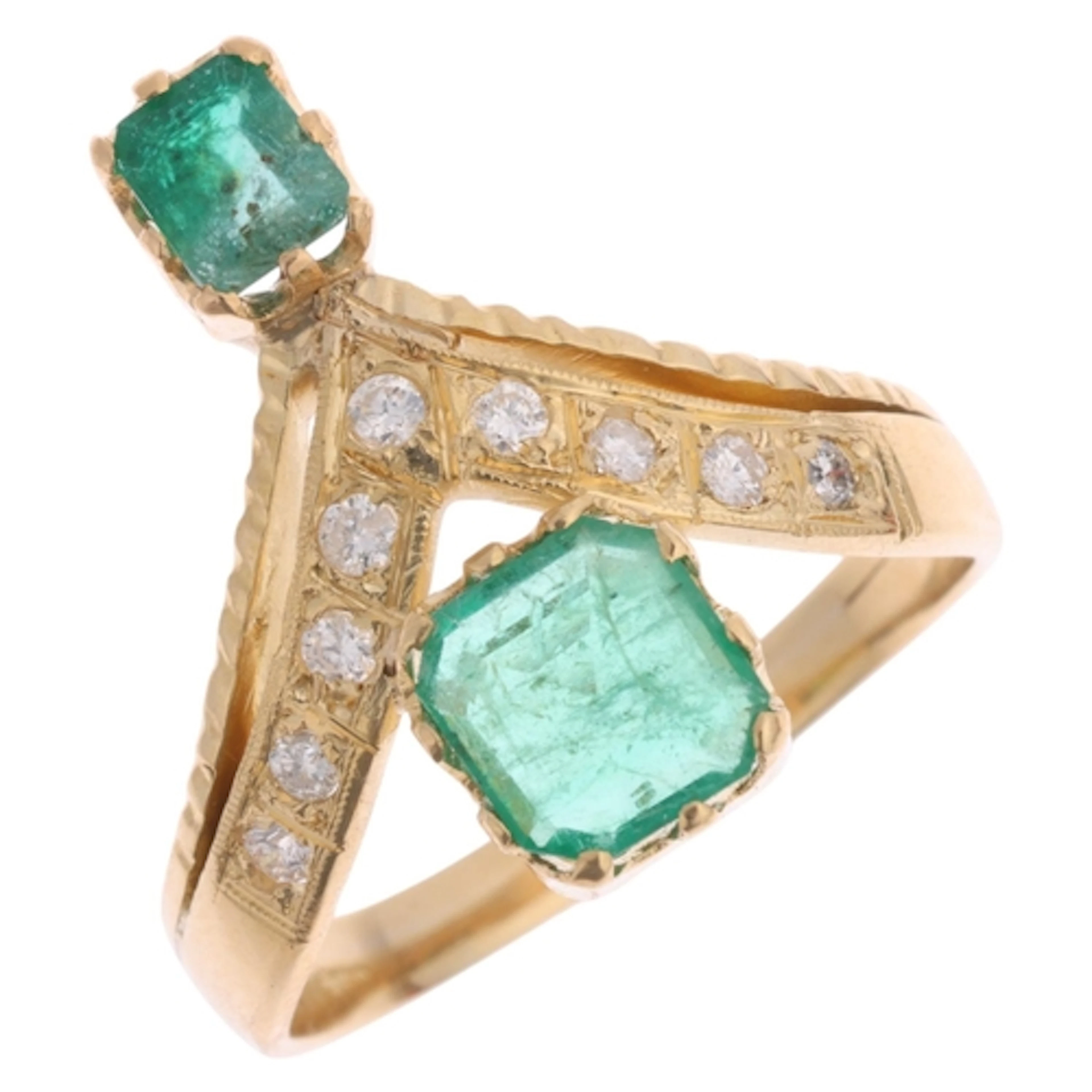 An 18ct gold emerald and diamond wishbone ring, set with 2 o...