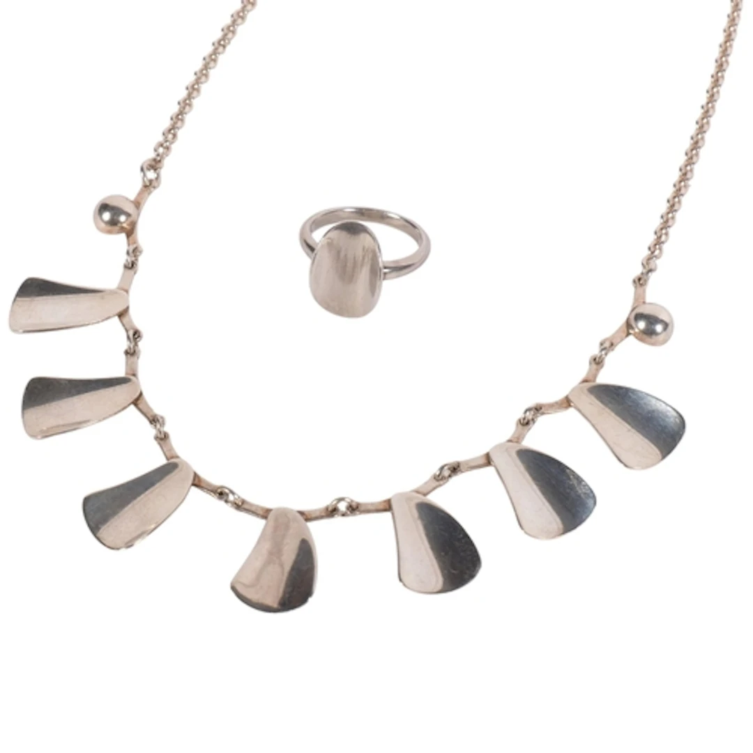 T.H. SKAT RORDAM - a sterling silver necklace and ring, by C...
