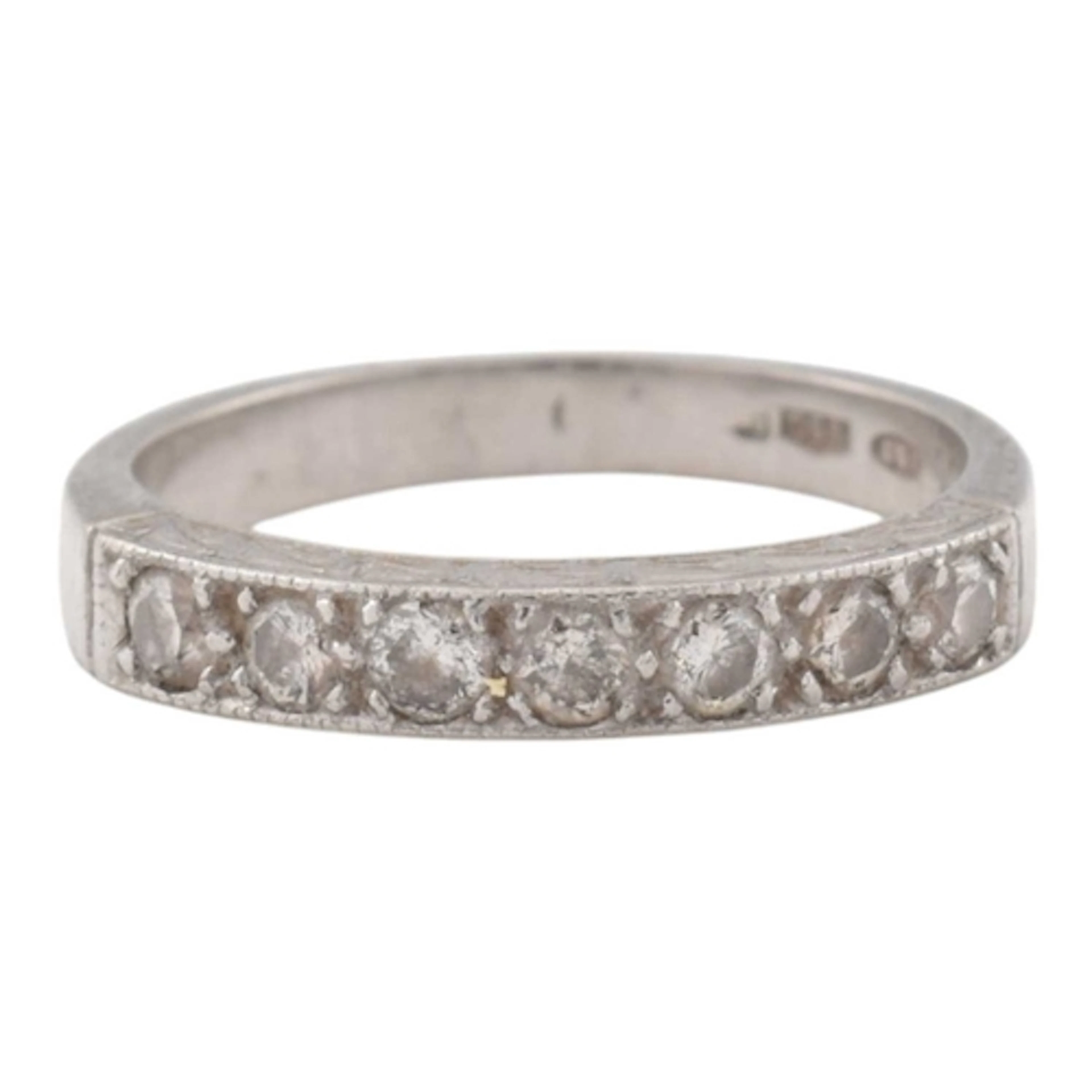 A hallmarked 950 platinum and diamond half hoop ring. Partia...