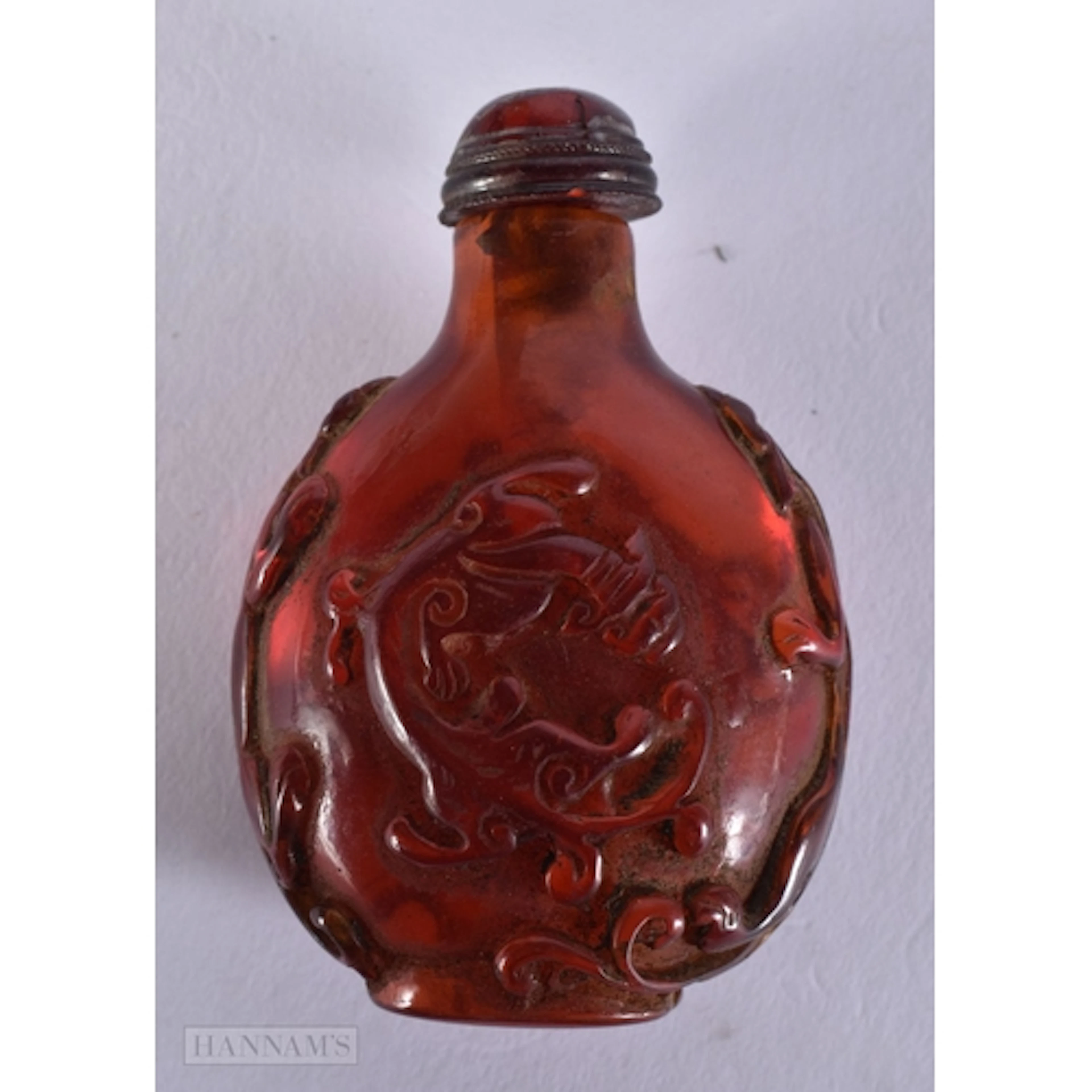 A ORIENTAL ORANGE SNUFF BOTTLE. 6.6 x 4.5 x 2.6 cm