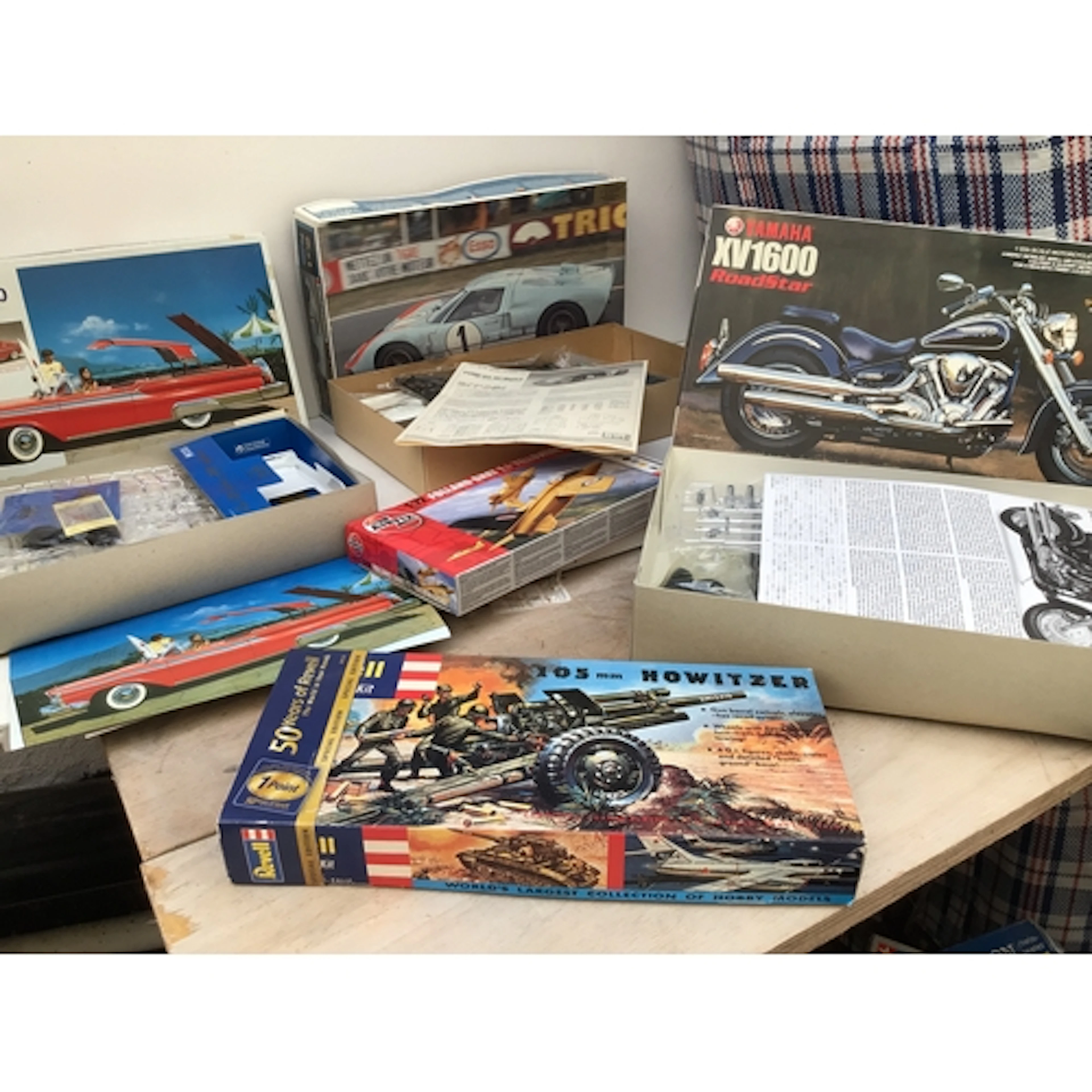 A bagged collection of boxed model kits by manufacturers inc...