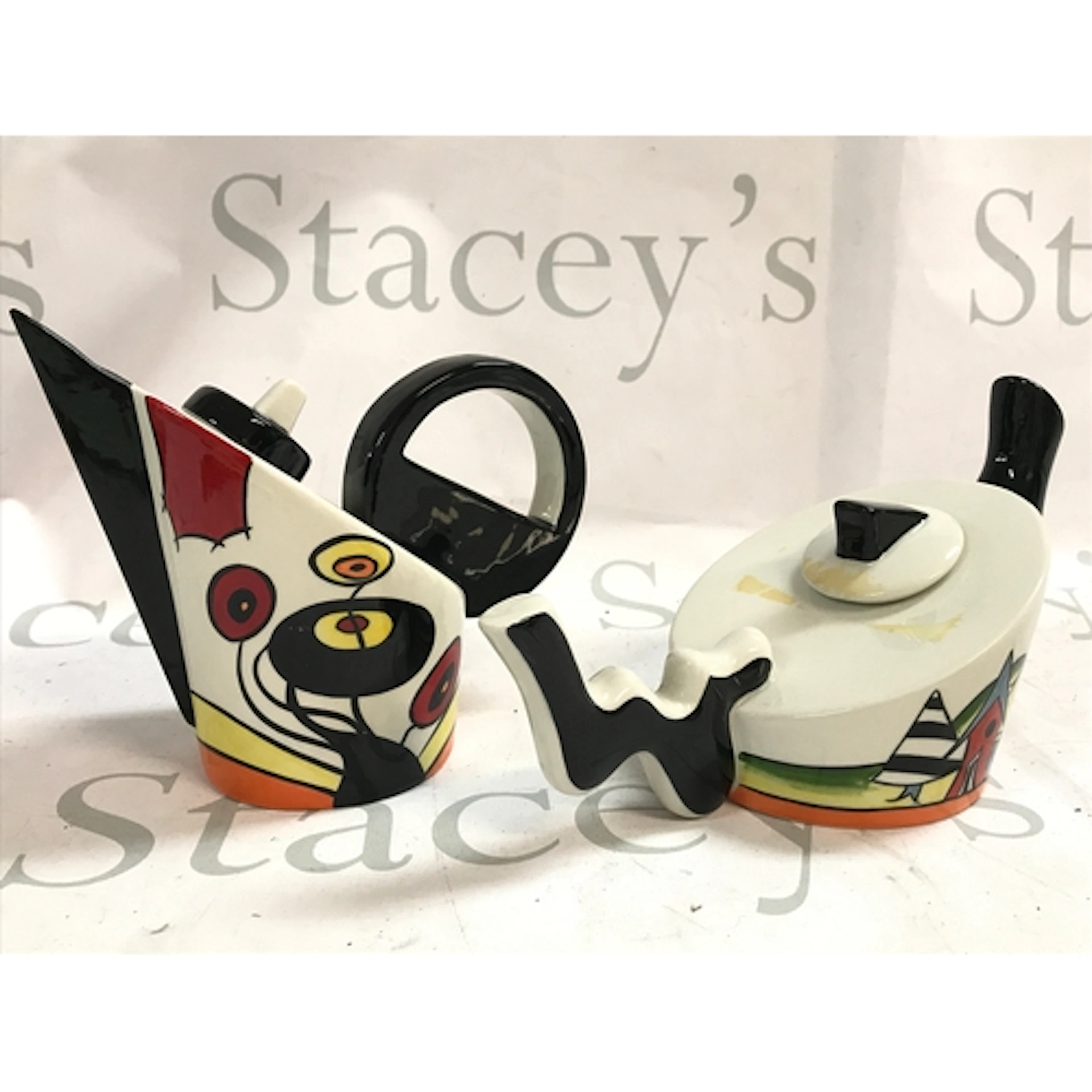 Lorna Bailey teapots. 11 and 14cm tall