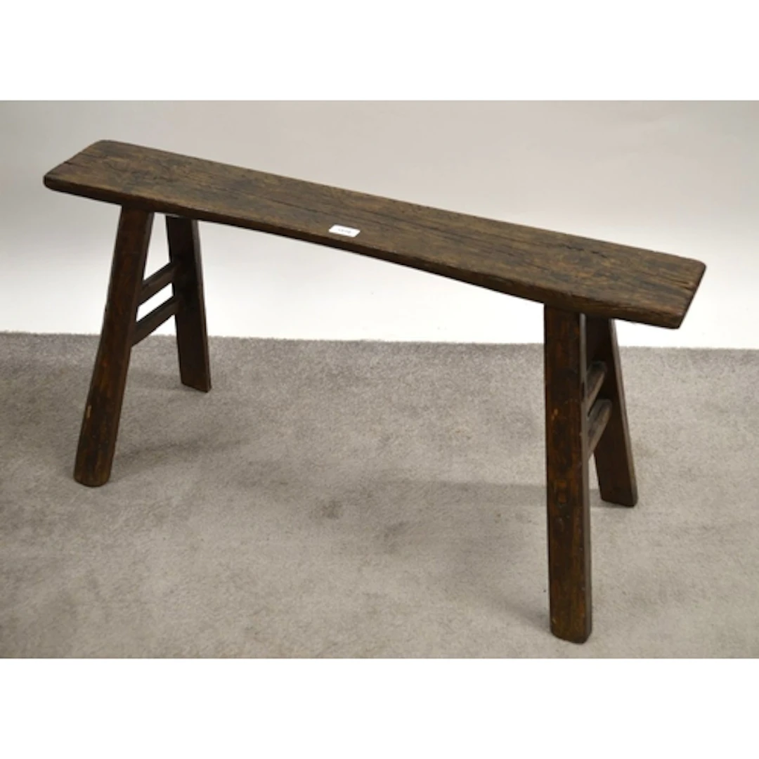 Primitive stained pine narrow bench / sawhorse, on splay sup...