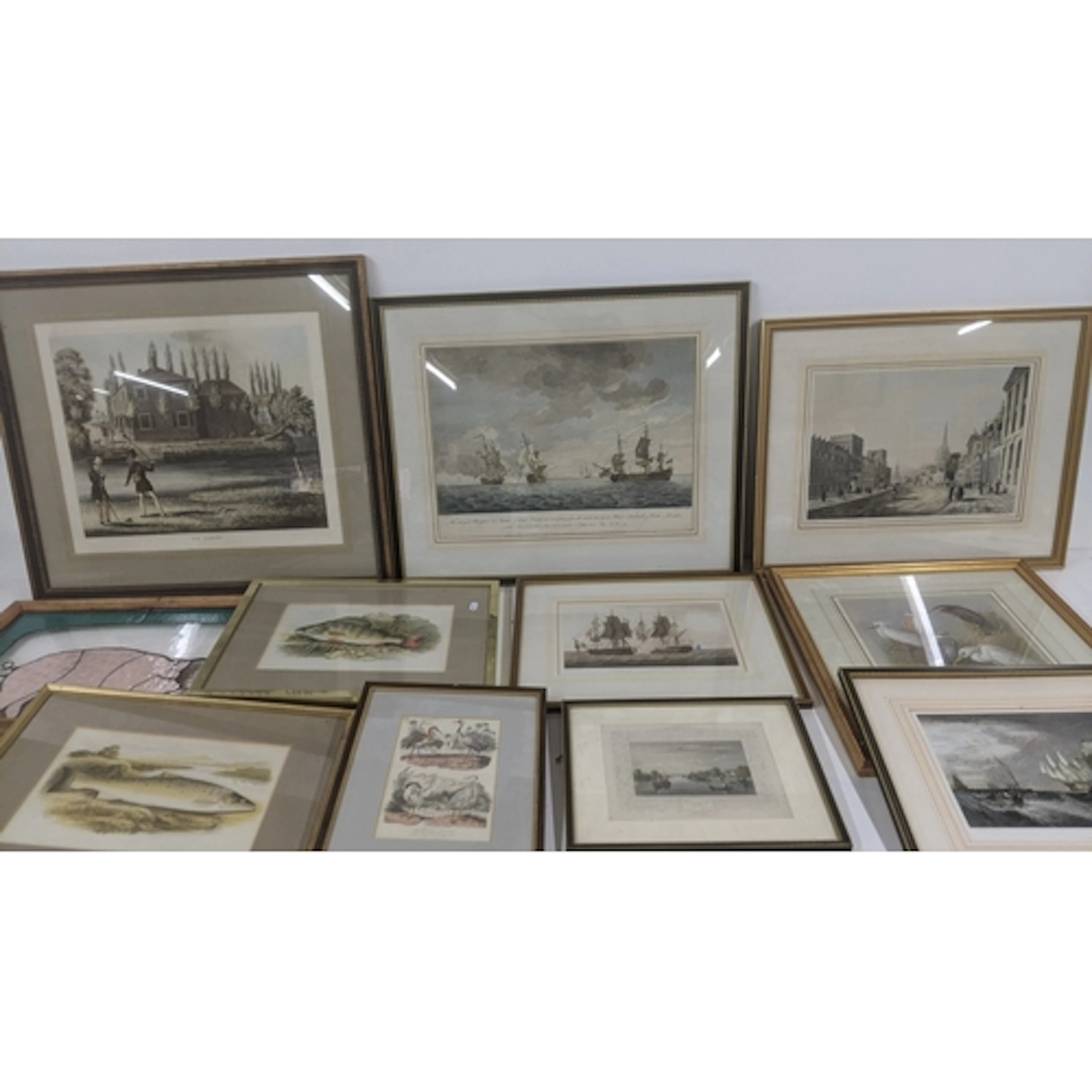 A collection of framed and glazed prints to include one depi...