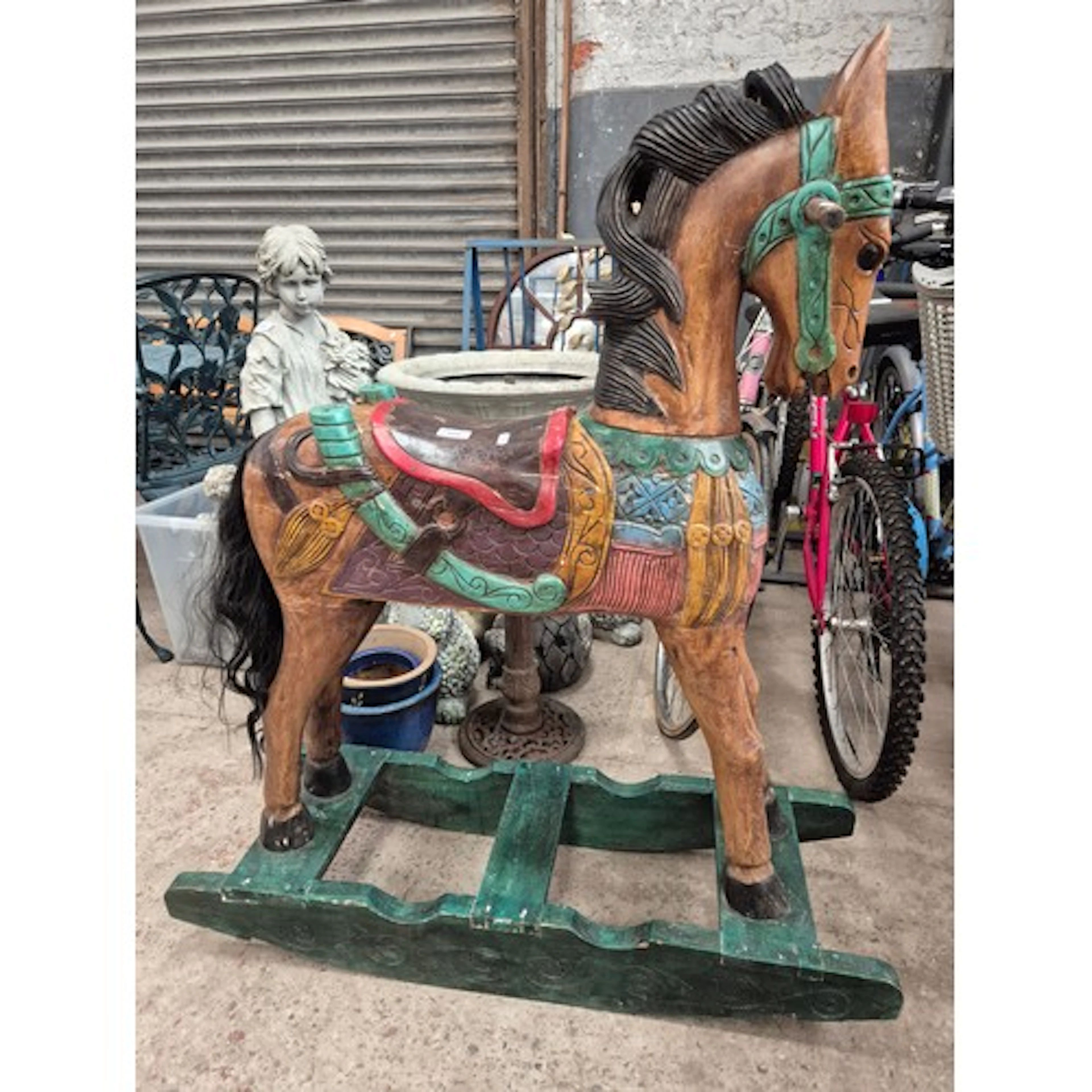 An Indian wood hand painted vintage rocking horse