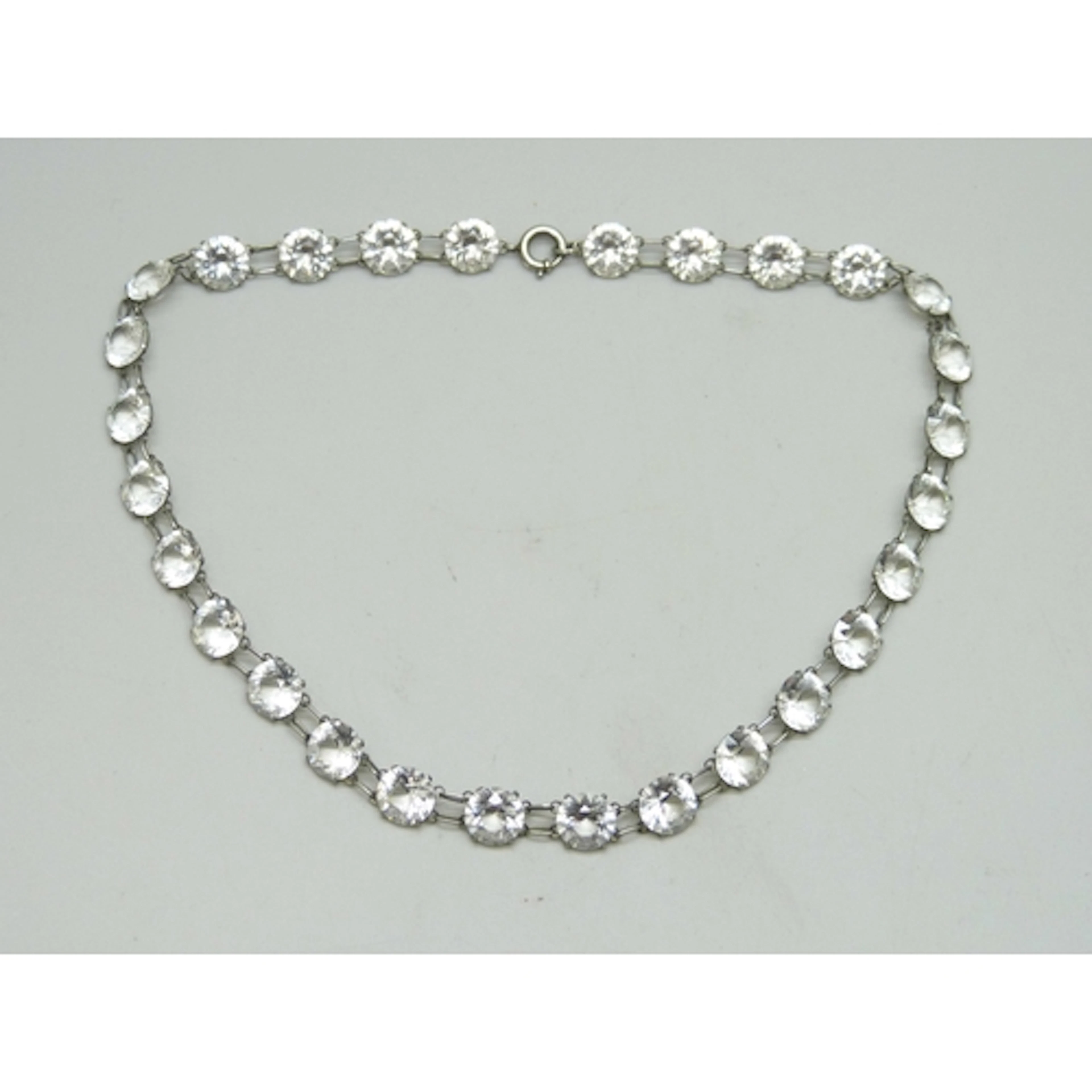 An Art Deco circa 1930s paste set riviere necklace, 36cm, 15...