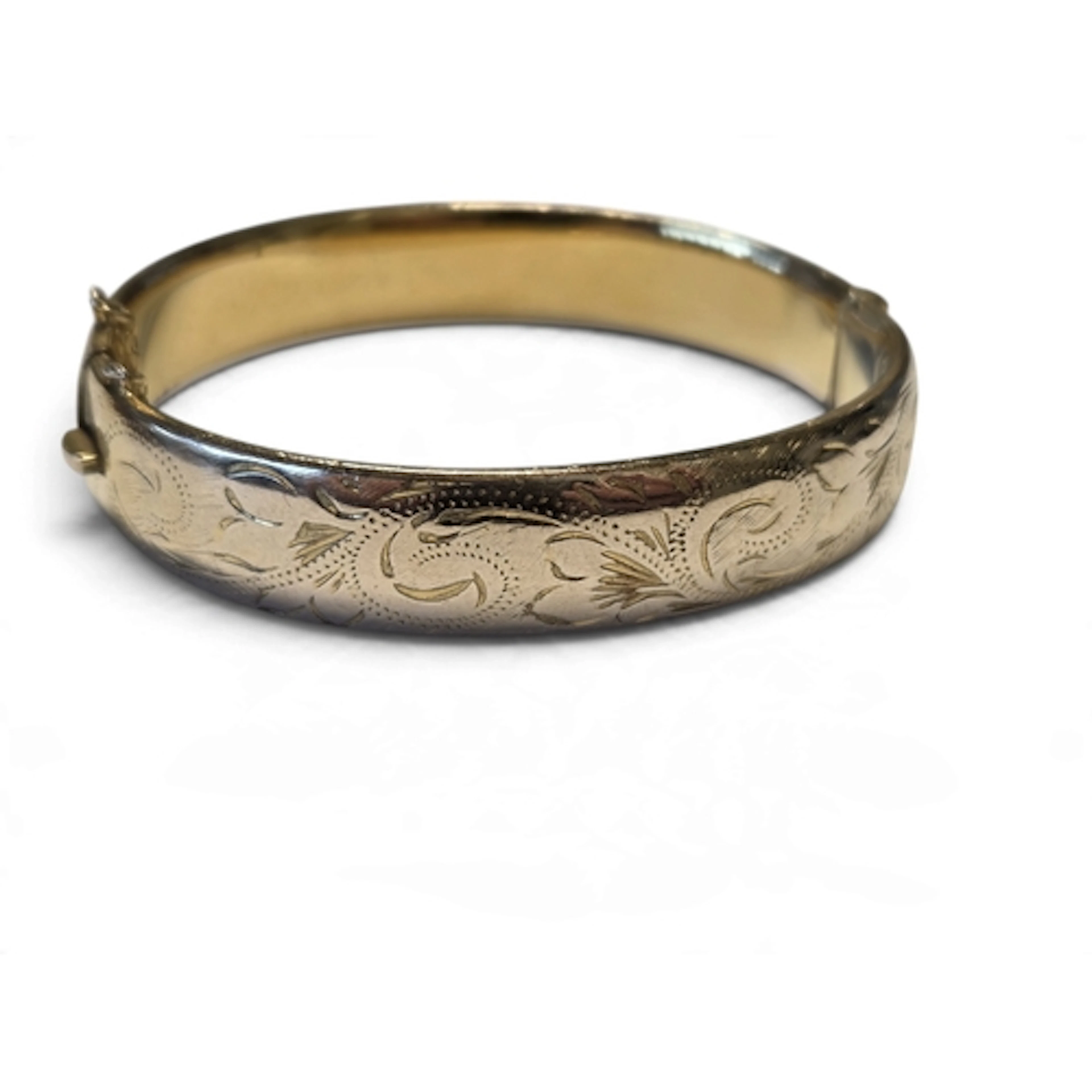 A vintage 9 carat rolled gold. An engraved bangle, consistin...